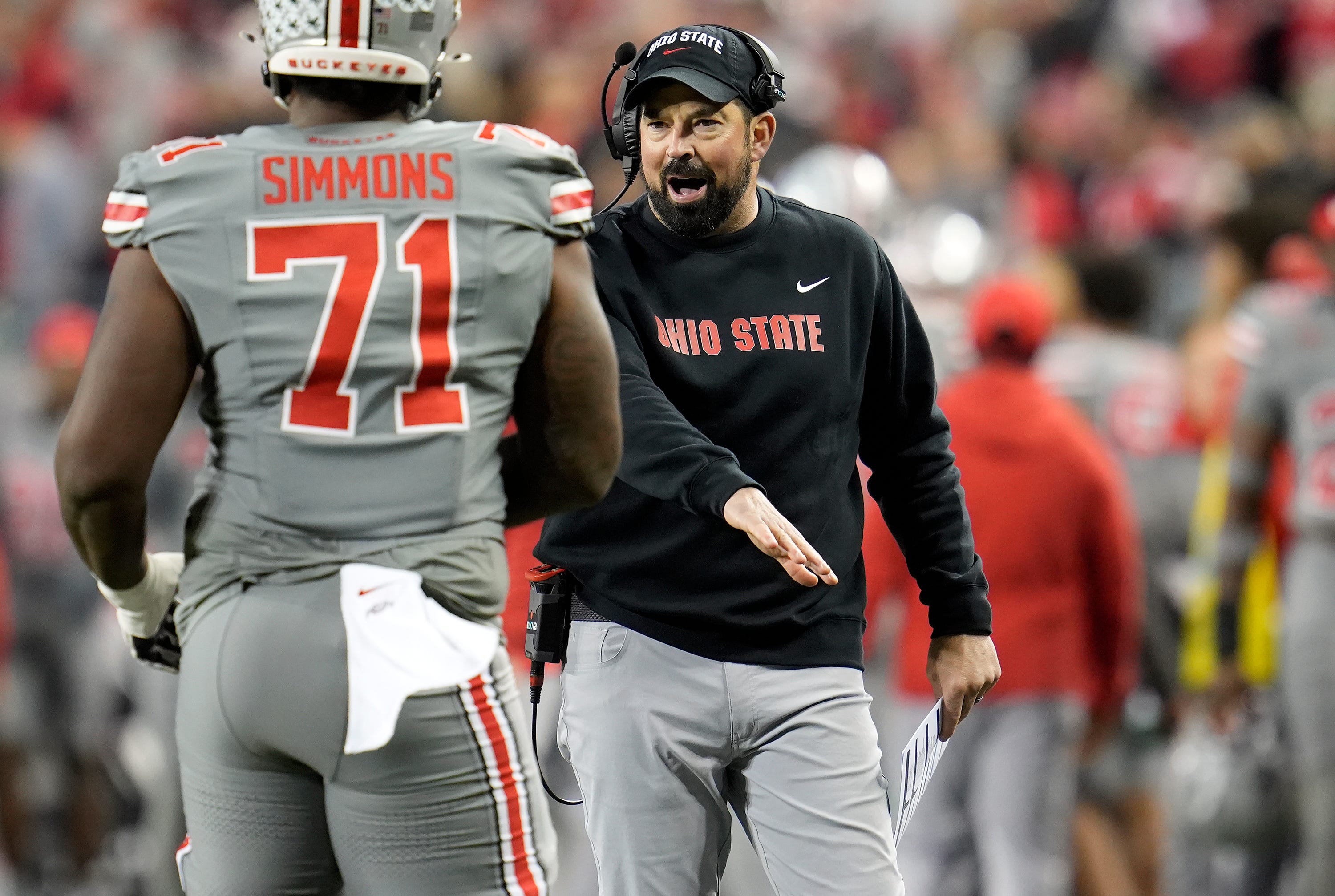 Nov 11, 2023; Columbus, Ohio, USA; OSU Head Coach Ryan Day cheers Ohio State Buckeyes offensive lineman Josh Simmons (71) as he returns to the bench during the NCAA football game against Michigan State University at Ohio Stadium.