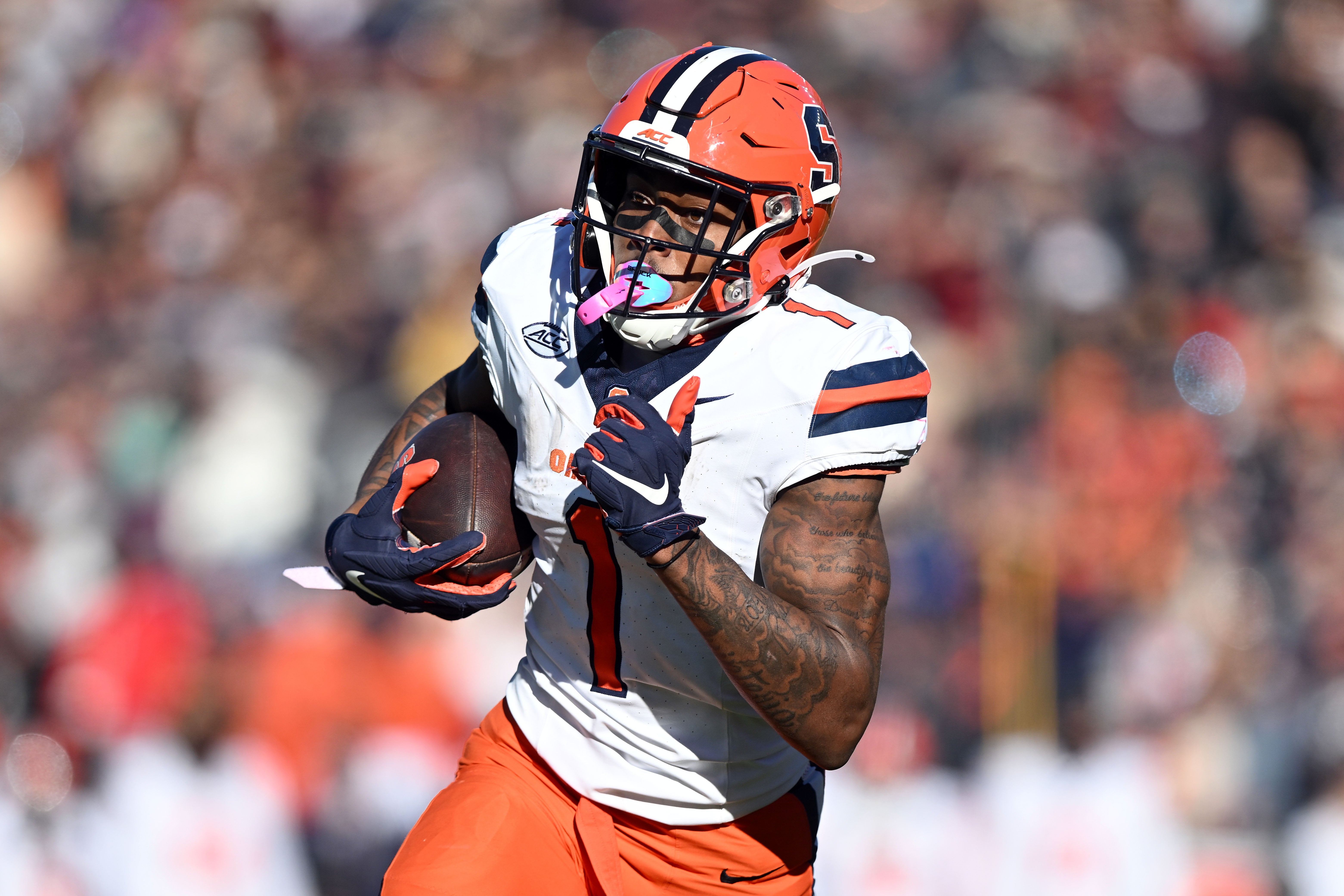 Nov 9, 2024; Chestnut Hill, Massachusetts, USA; Syracuse Orange running back LeQuint Allen (1) runs for a touchdown against the Boston College Eagles during the first half at Alumni Stadium.
