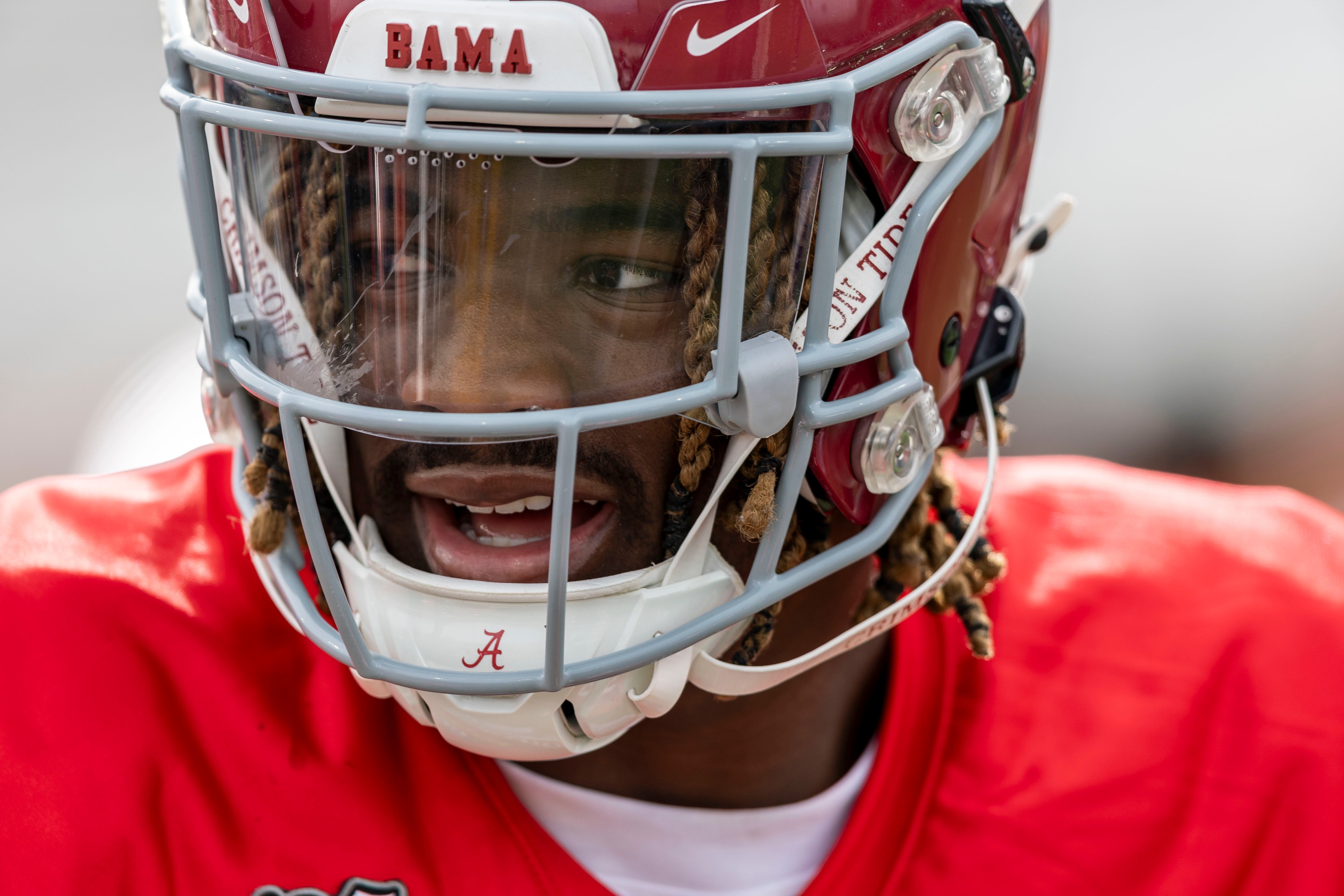 Jan 28, 2025; Mobile, AL, USA; American team quarterback Jalen Milroe of Alabama (4) calls cadence during Senior Bowl practice for the American team at Hancock Whitney Stadium.