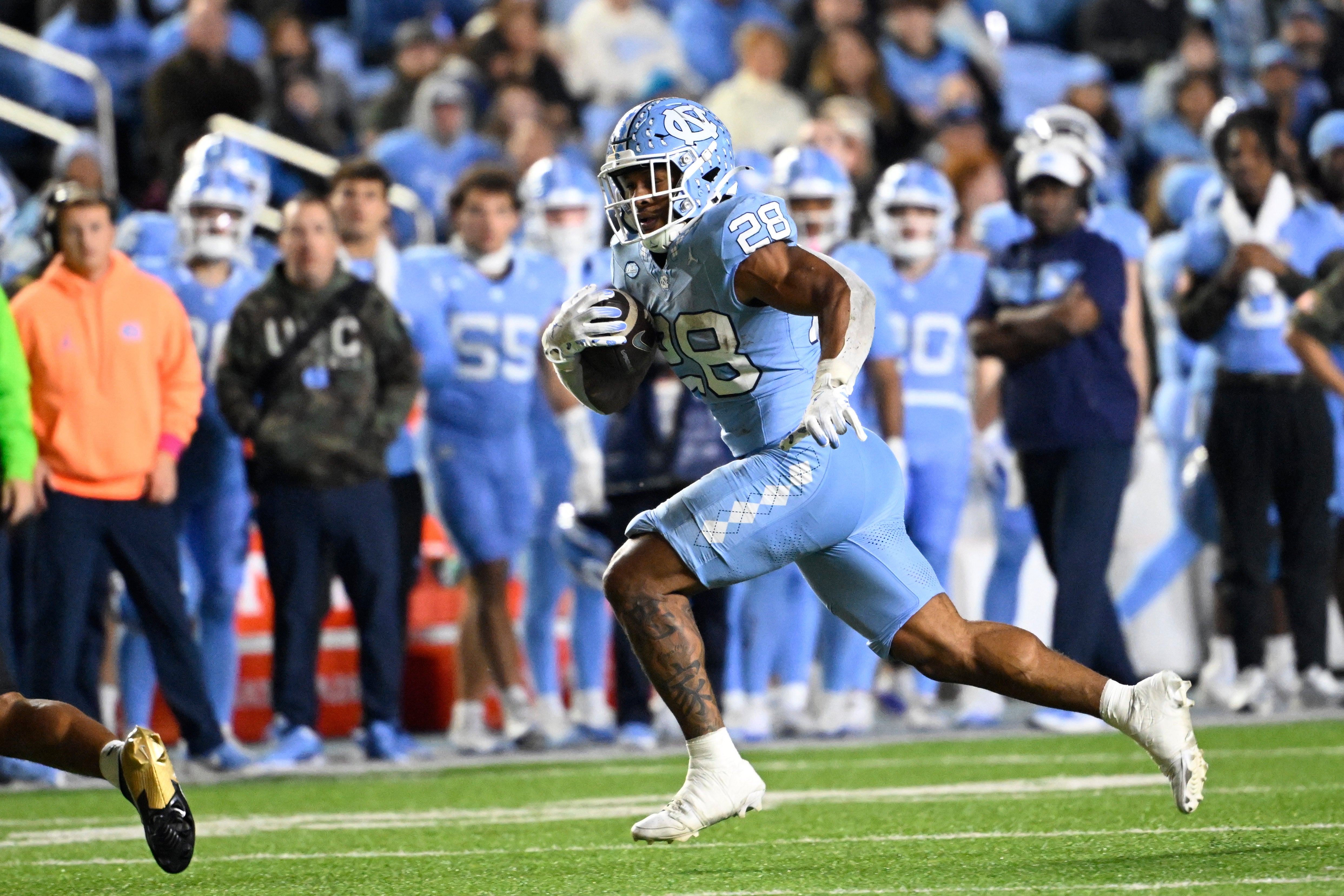 Nov 16, 2024; Chapel Hill, North Carolina, USA; North Carolina Tar Heels running back Omarion Hampton (28) runs in the second quarter at Kenan Memorial Stadium.