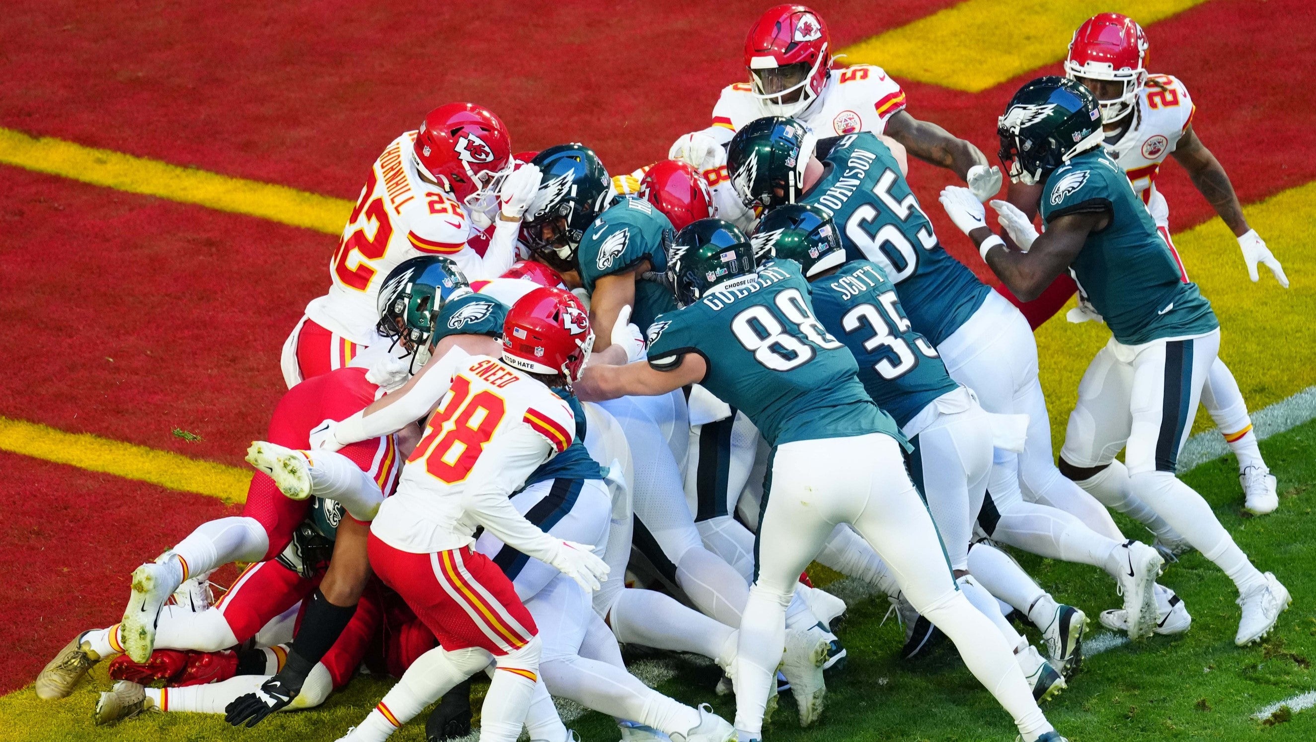 Philadelphia Eagles quarterback Jalen Hurts (1) scores a touchdown on a quarterback sneak against the Kansas City Chiefs during the first quarter in Super Bowl LVII at State Farm Stadium in Glendale on Feb. 12, 2023.