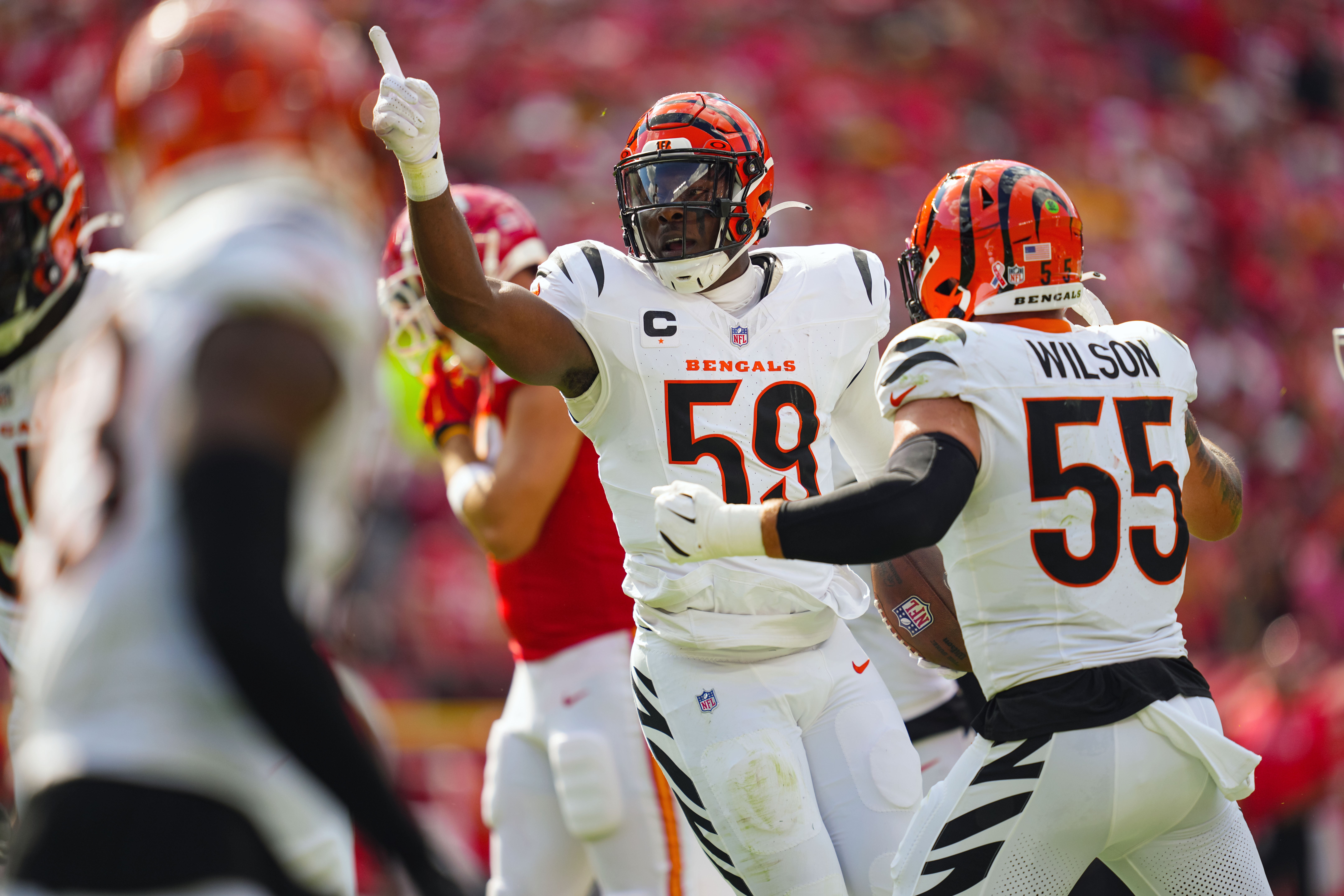 Sep 15, 2024; Kansas City, Missouri, USA; Cincinnati Bengals linebacker Akeem Davis-Gaither (59) celebrates after an interception during the first half against the Kansas City Chiefs at GEHA Field at Arrowhead Stadium.