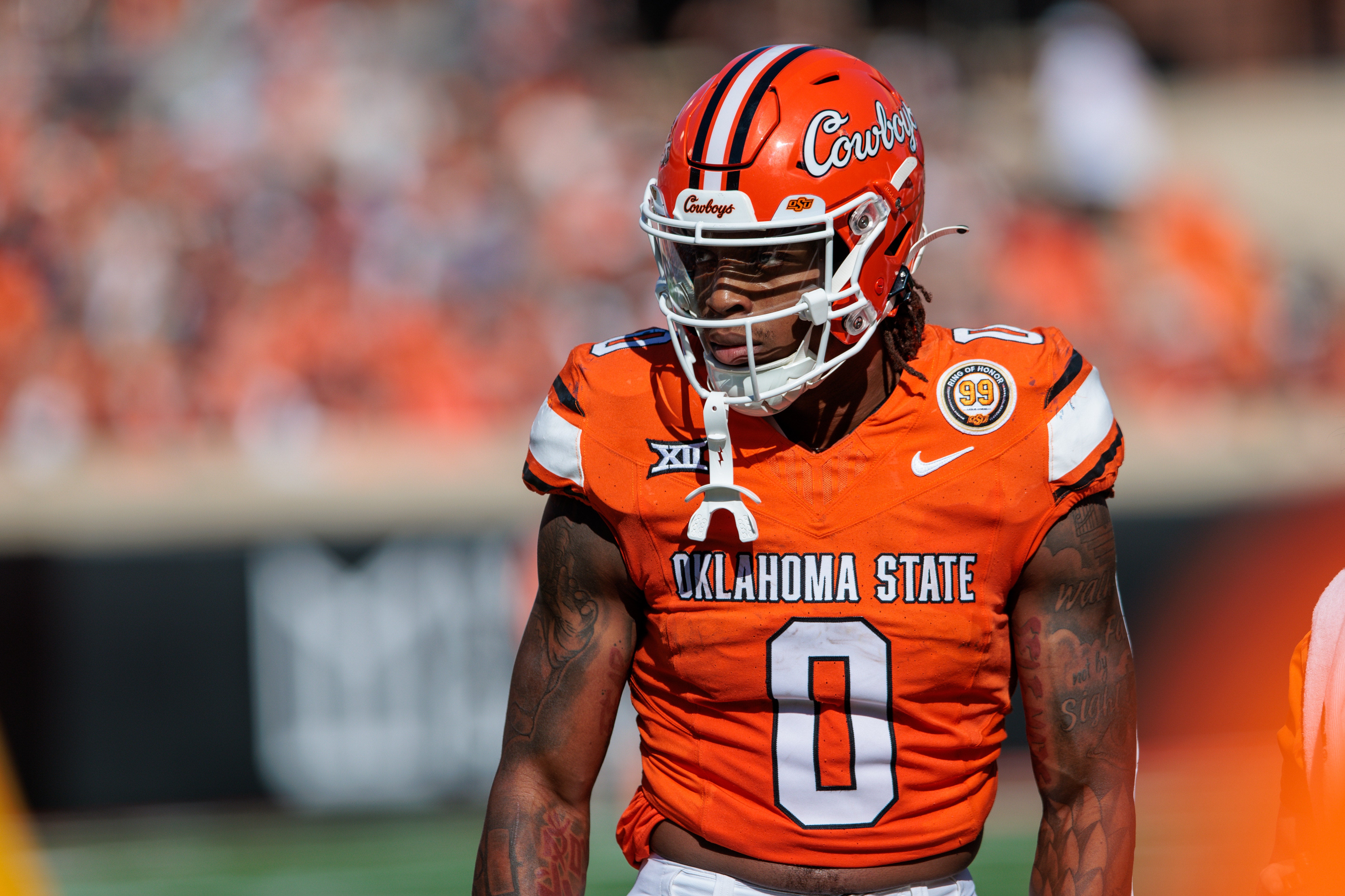 Oct 5, 2024; Stillwater, Oklahoma, USA; Oklahoma State Cowboys running back Ollie Gordon II (0) during a break in play in the first quarter against the West Virginia Mountaineers at Boone Pickens Stadium.