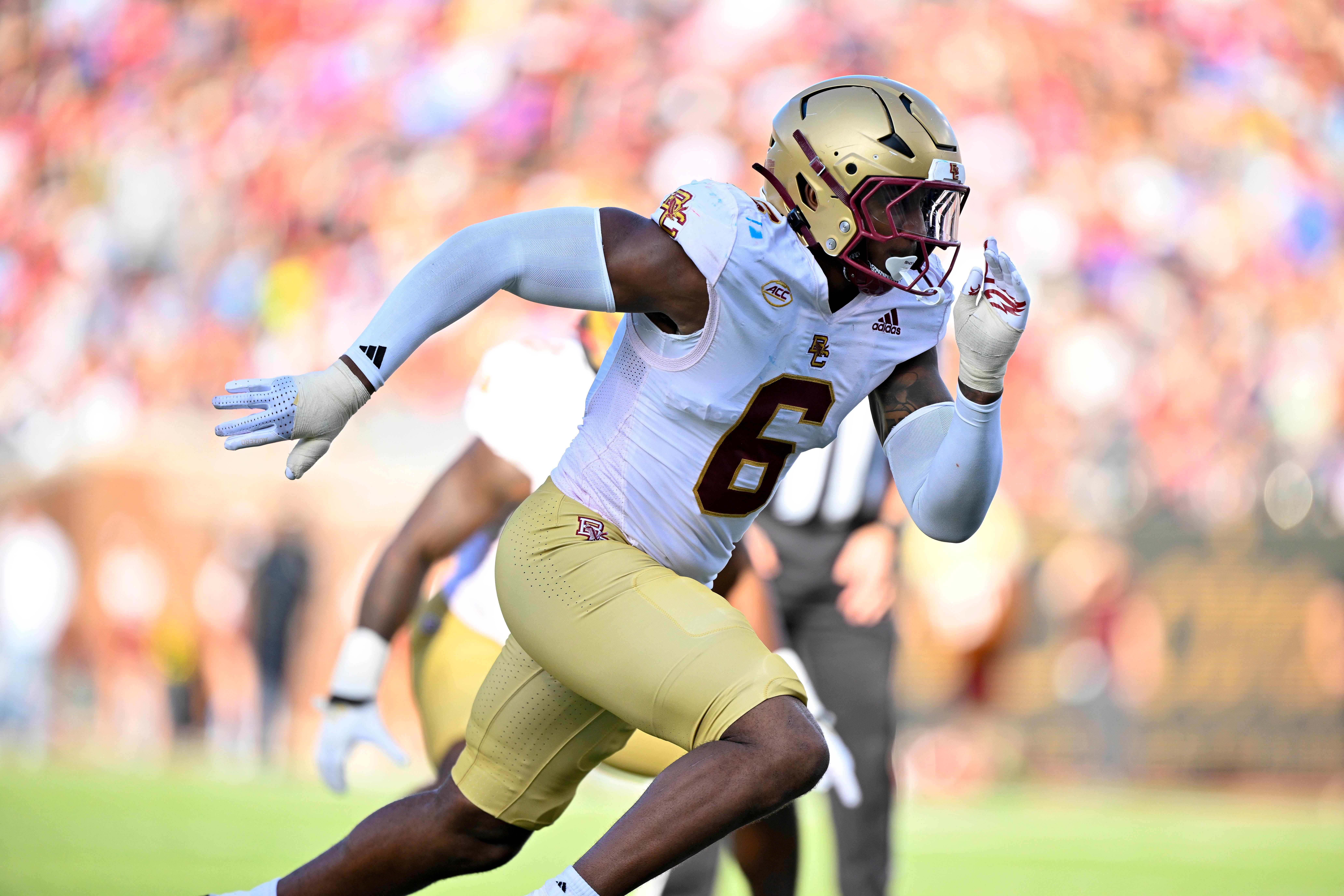 Nov 16, 2024; Dallas, Texas, USA; Boston College Eagles defensive end Donovan Ezeiruaku (6) rushes against the SMU Mustangs offense during the first half at the Gerald J. Ford Stadium.