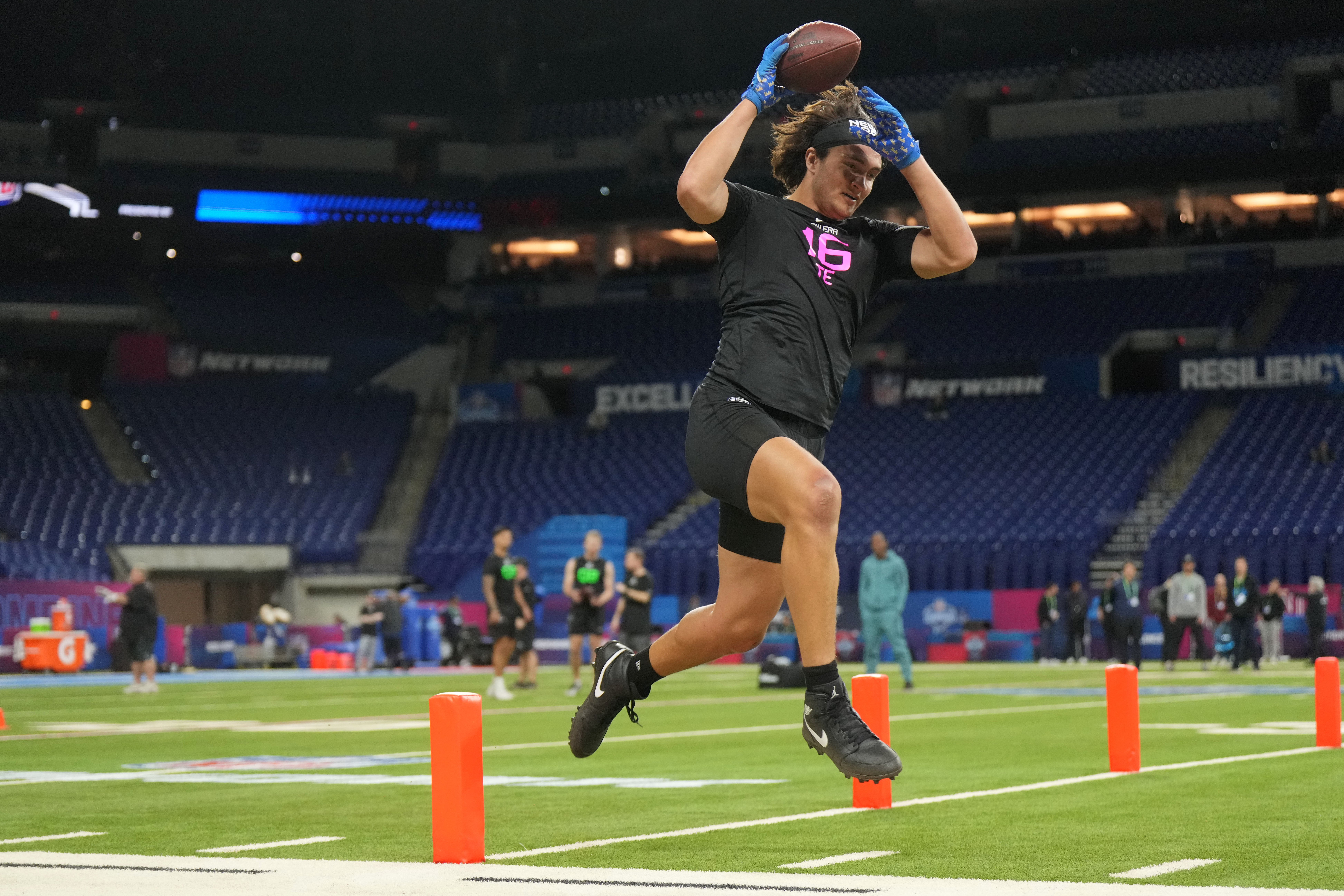 Feb 28, 2025; Indianapolis, IN, USA; UCLA tight end Moliki Matavao (TE16) participates in drills during the 2025 NFL Combine at Lucas Oil Stadium.