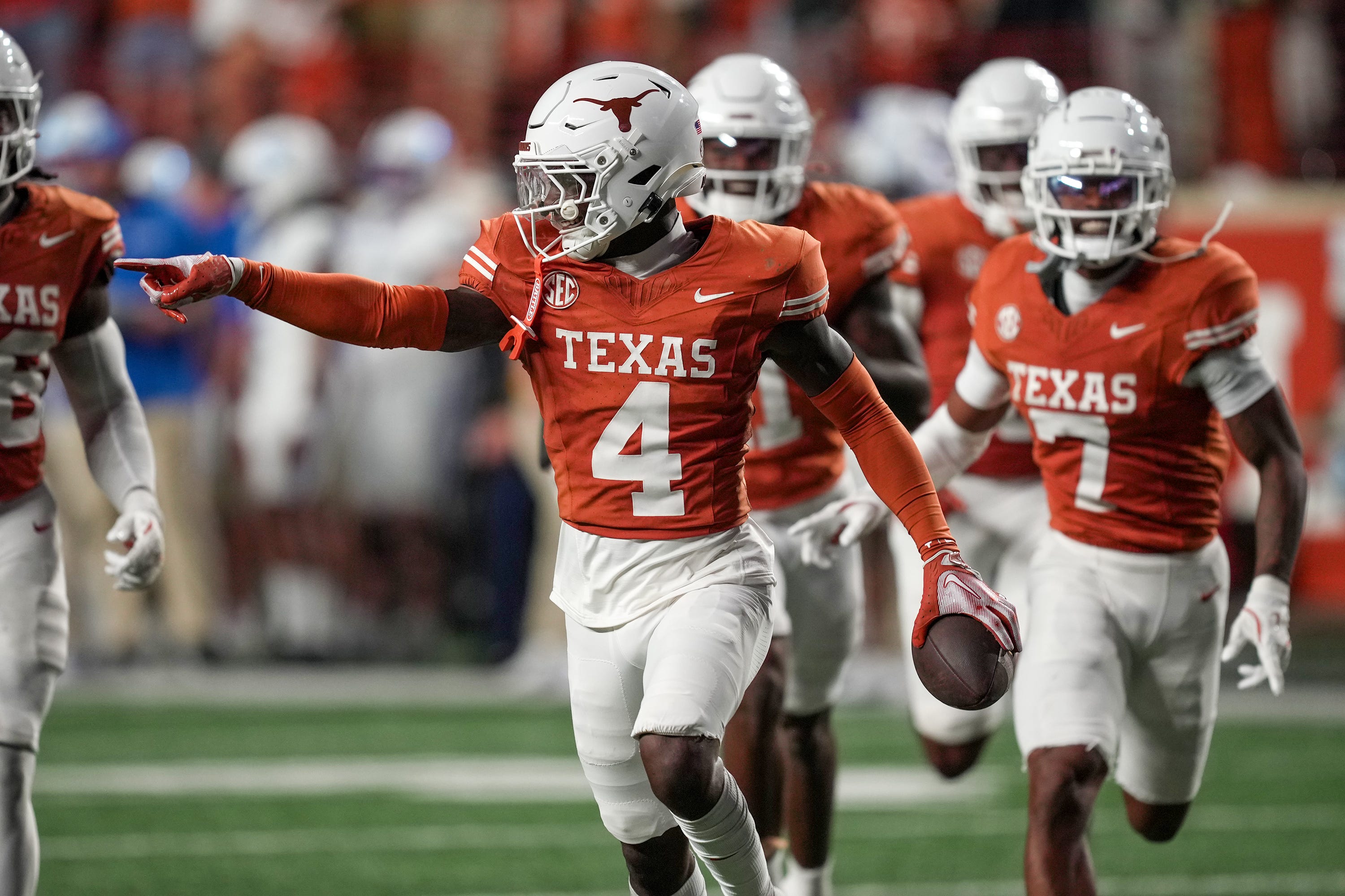 Texas Longhorns defensive back Andrew Mukuba (4) celebrates a interception against Kentucky Wildcats late in the fourth quarter in a NCAA college football game at Darrell K Royal Texas Memorial Stadium, Austin, Texas, Saturday, Nov 24, 2024.
