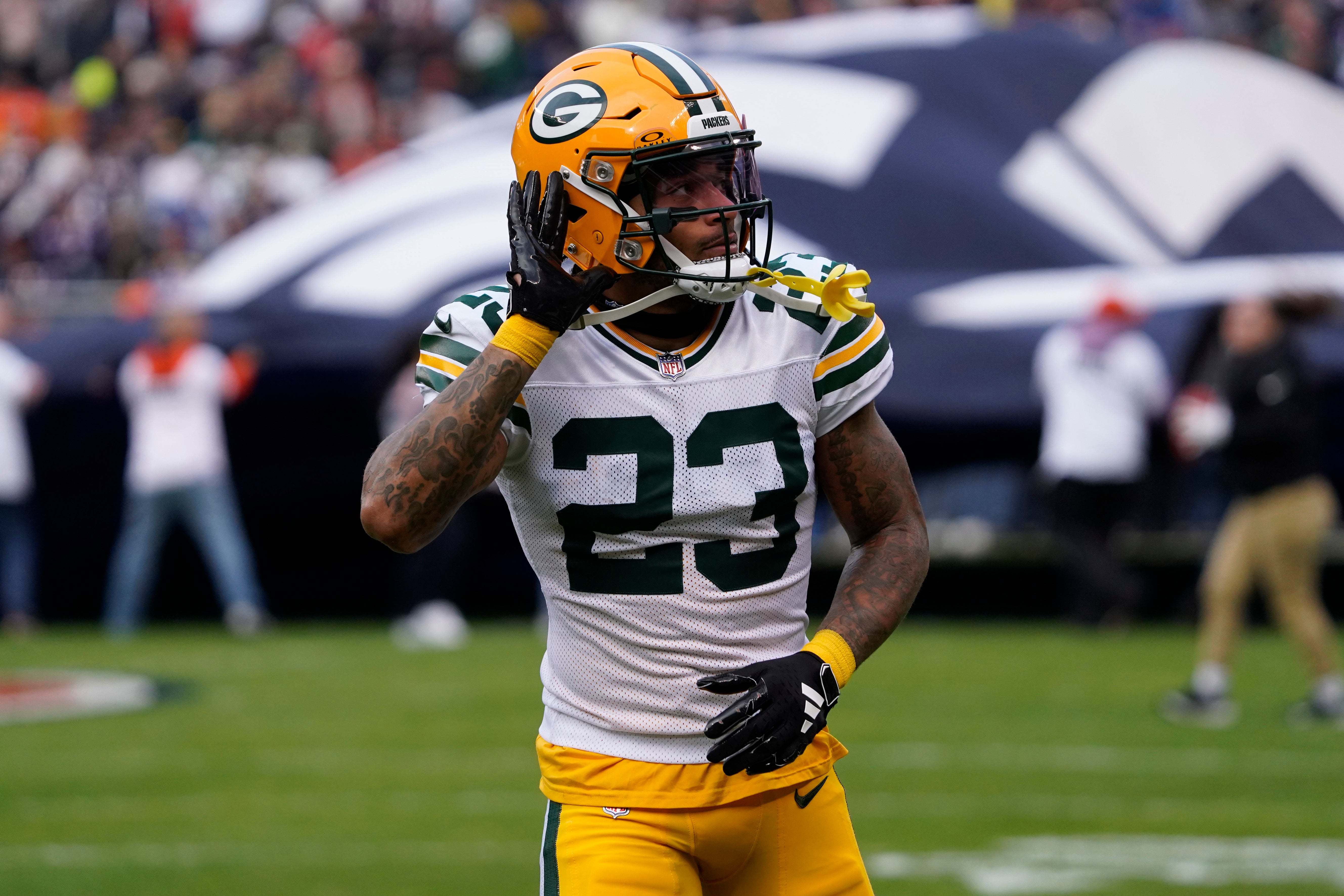 Nov 17, 2024; Chicago, Illinois, USA; Green Bay Packers cornerback Jaire Alexander (23) gestures to the fans before the game against the Chicago Bears at Soldier Field.