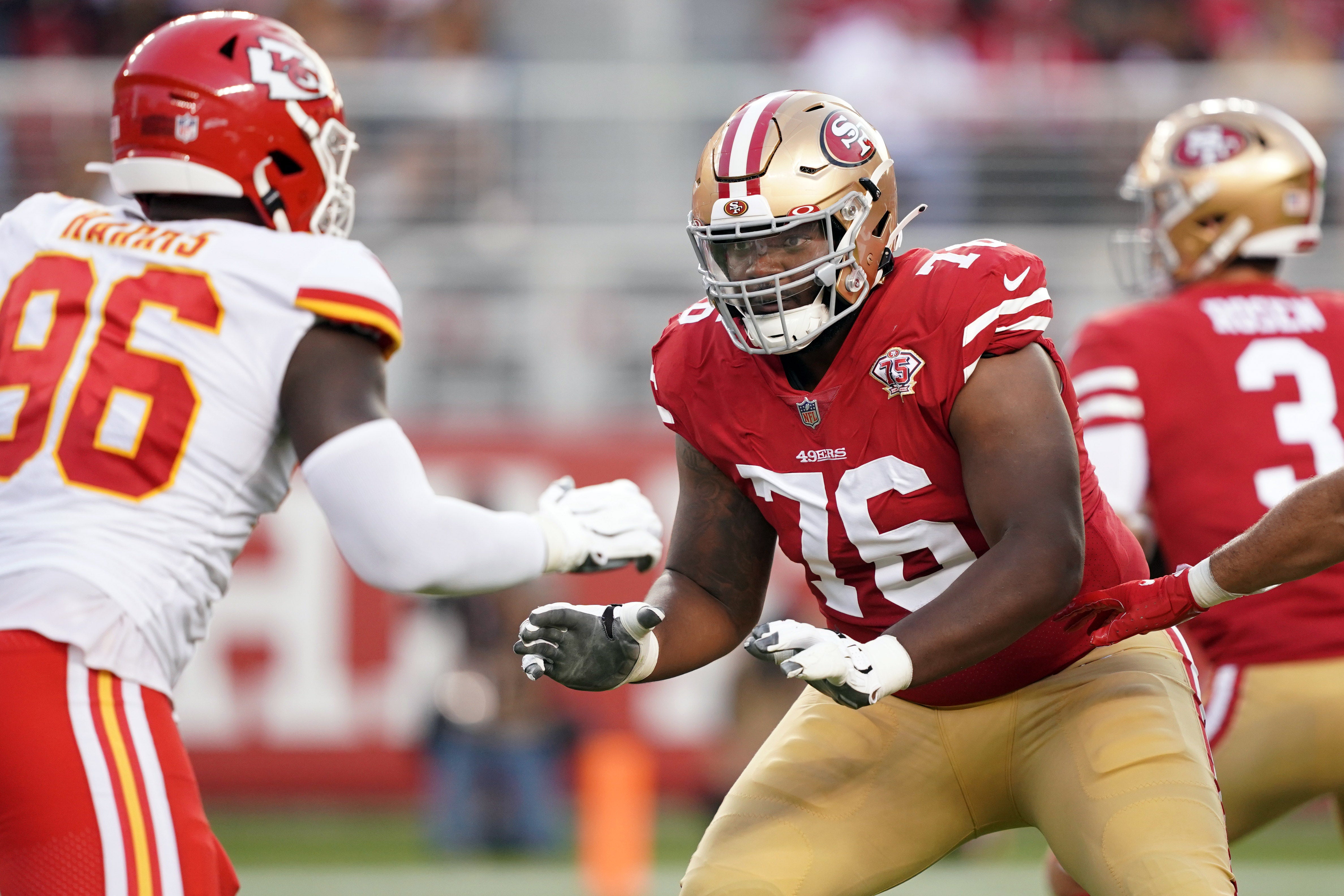Aug 14, 2021; Santa Clara, California, USA; San Francisco 49ers offensive tackle Jaylon Moore (76) blocks Kansas City Chiefs defensive end Demone Harris (96) during the third quarter at Levi's Stadium.