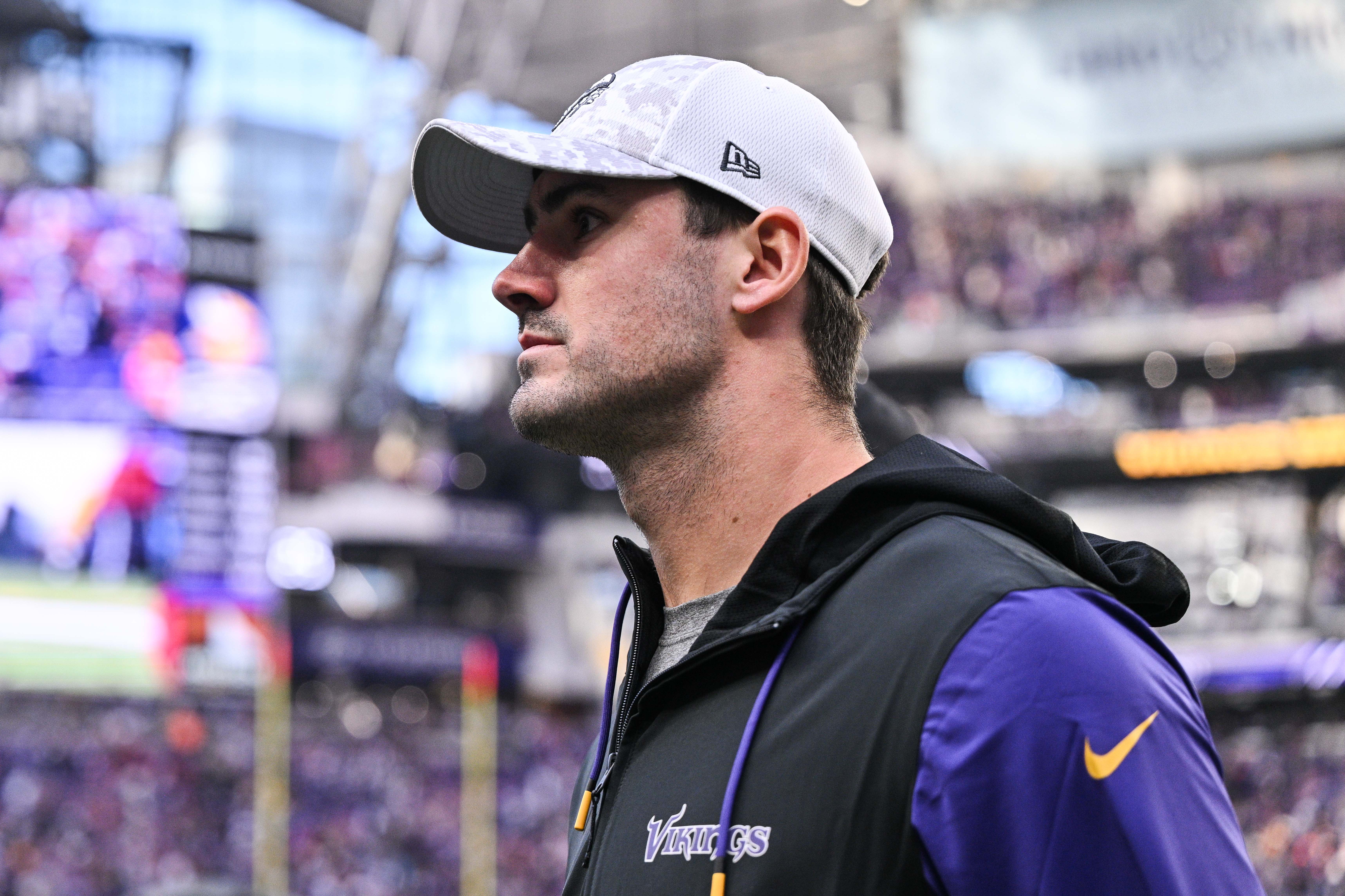 Dec 1, 2024; Minneapolis, Minnesota, USA; Newly acquired Minnesota Vikings quarterback Daniel Jones walks off the field after the game against the Arizona Cardinals at U.S. Bank Stadium.