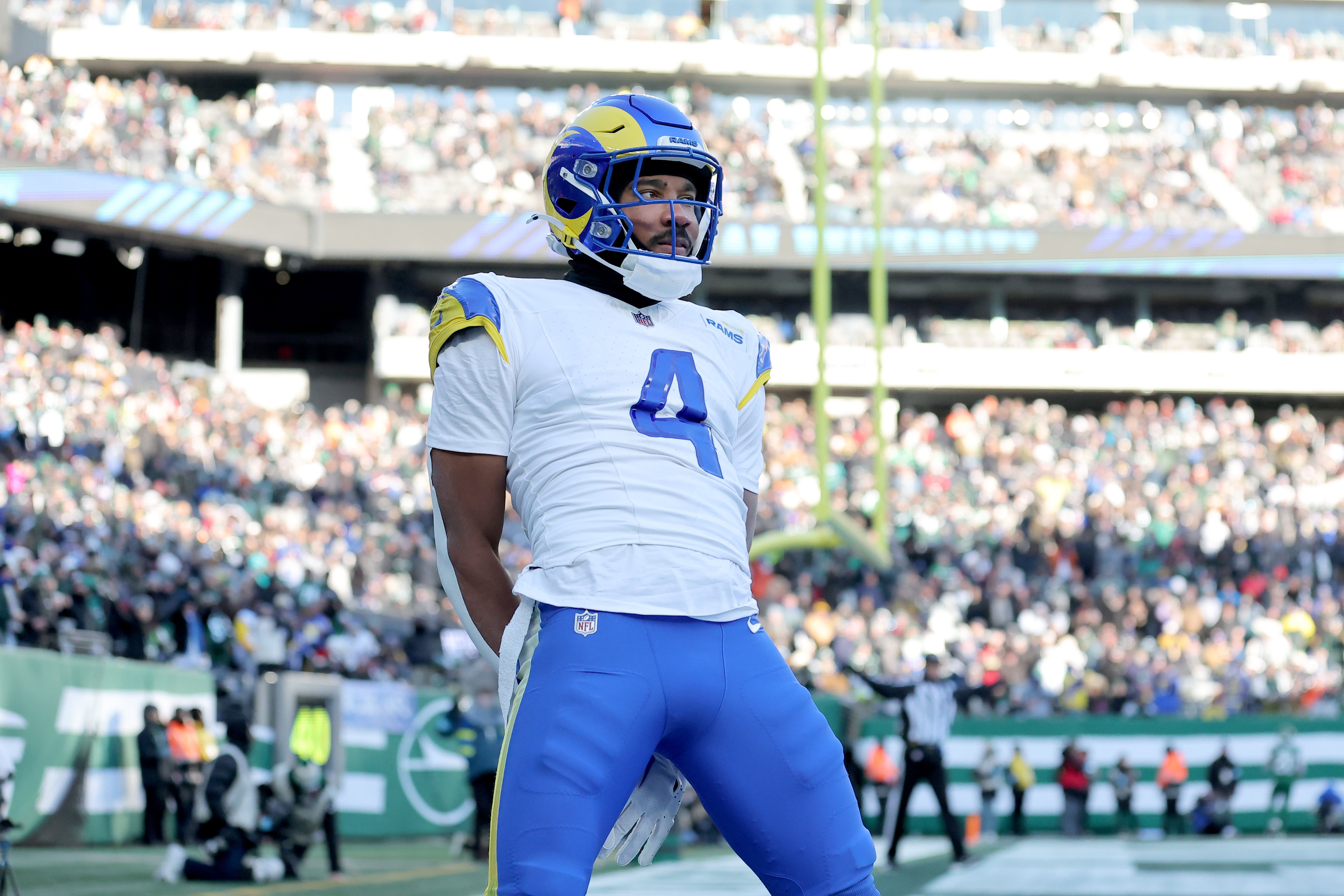 Dec 22, 2024; East Rutherford, New Jersey, USA; Los Angeles Rams cornerback Ahkello Witherspoon (4) celebrates after breaking up a pass during the third quarter against the New York Jets at MetLife Stadium.