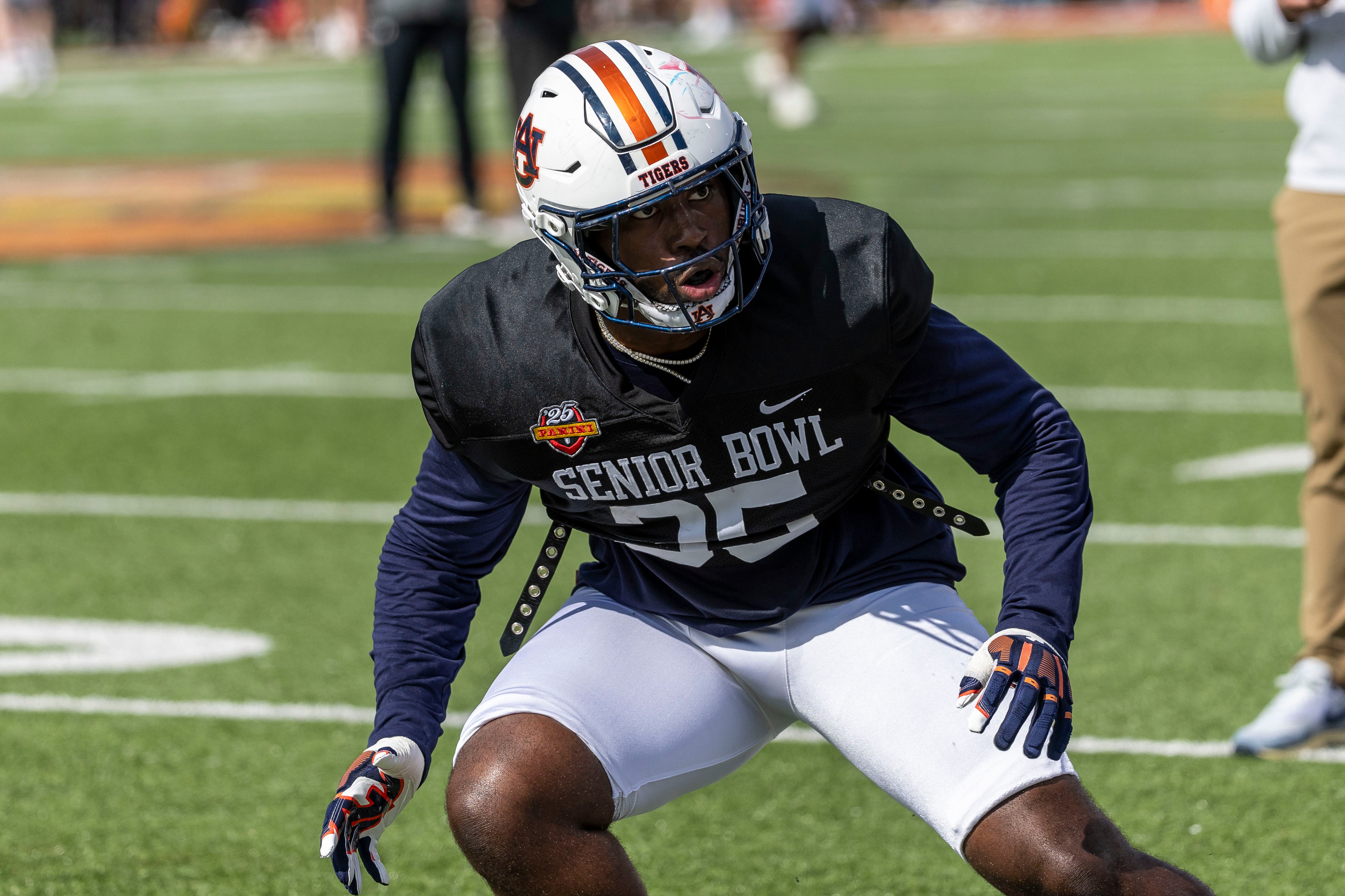 Jan 29, 2025; Mobile, AL, USA; American team linebacker Jalen McLeod of Auburn (35) works in drills during Senior Bowl practice for the National team at Hancock Whitney Stadium.