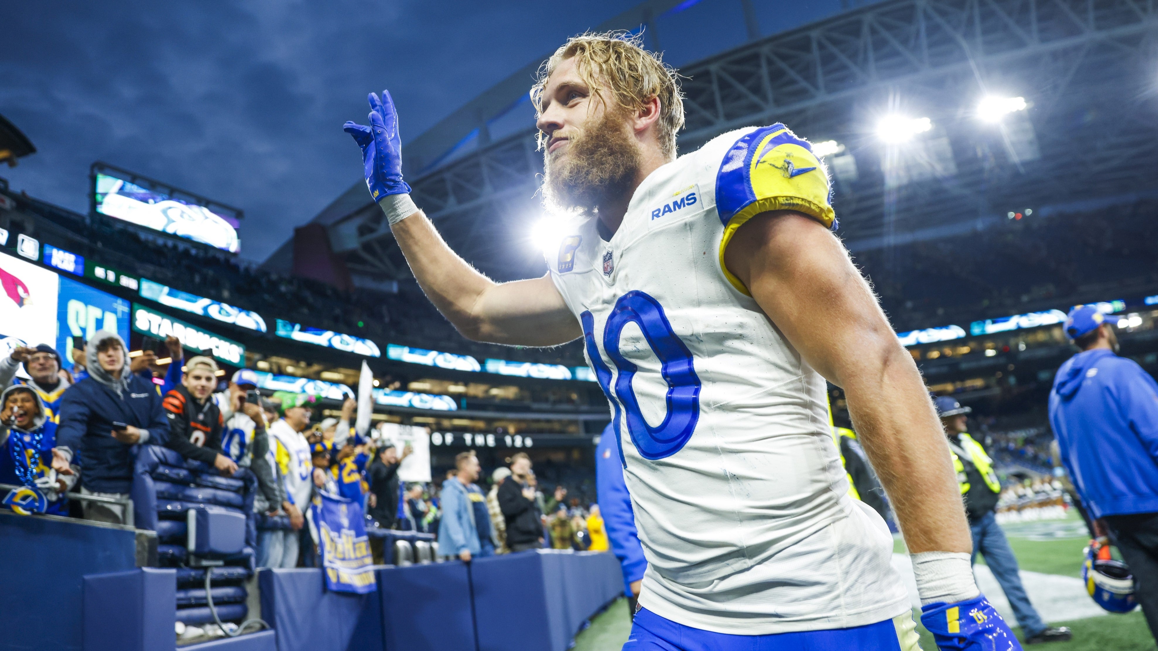 Nov 3, 2024; Seattle, Washington, USA; Los Angeles Rams wide receiver Cooper Kupp (10) waves to fans following an overtime victory against the Seattle Seahawks at Lumen Field.