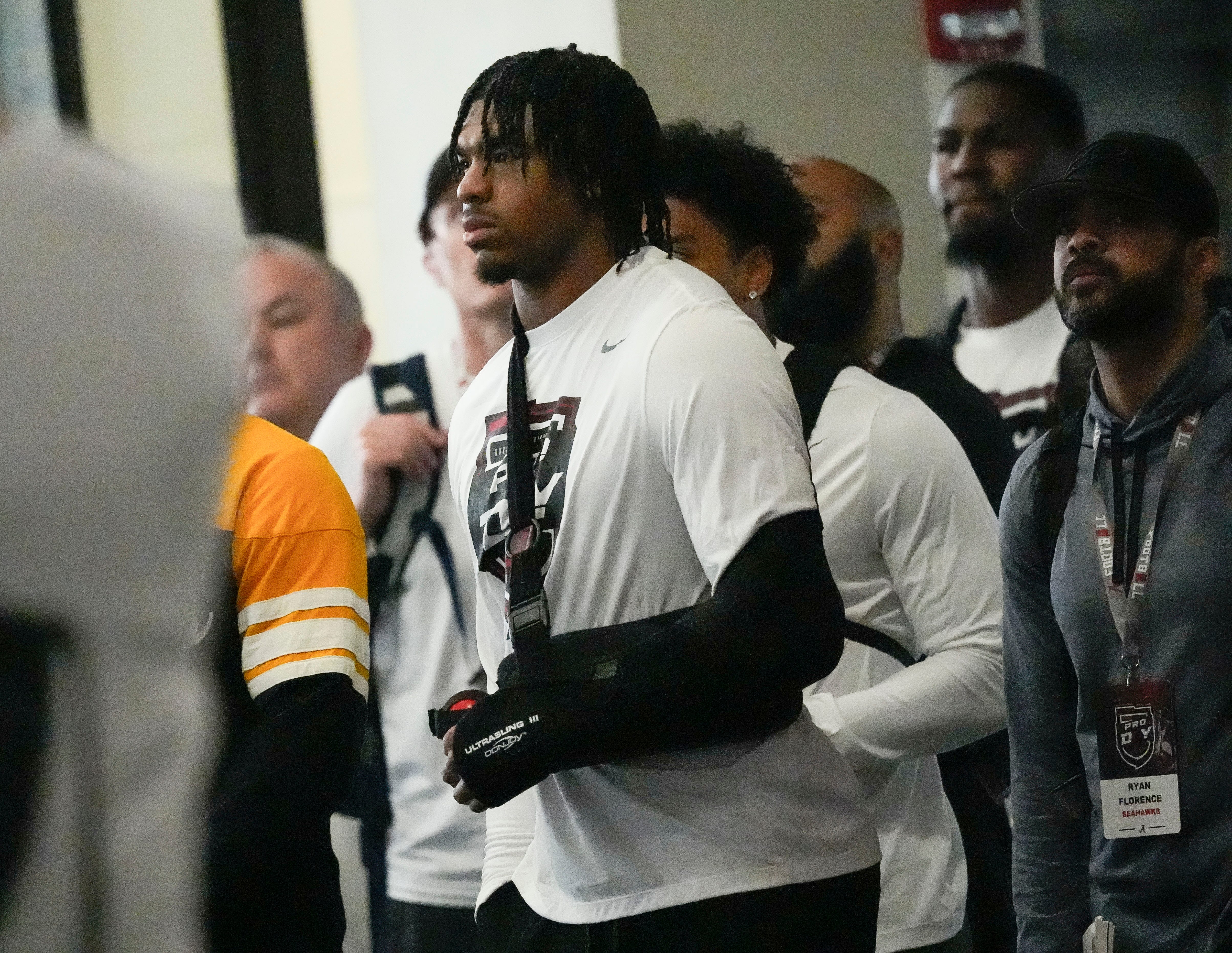 Mar 19, 2025; Tuscaloosa AL, USA; Linebacker Jihaad Campbell wears a sling on his left are during the University of Alabama Pro Day as several Crimson Tide players worked out for NFL teams in the Hank Crisp Indoor Practice Facility.
