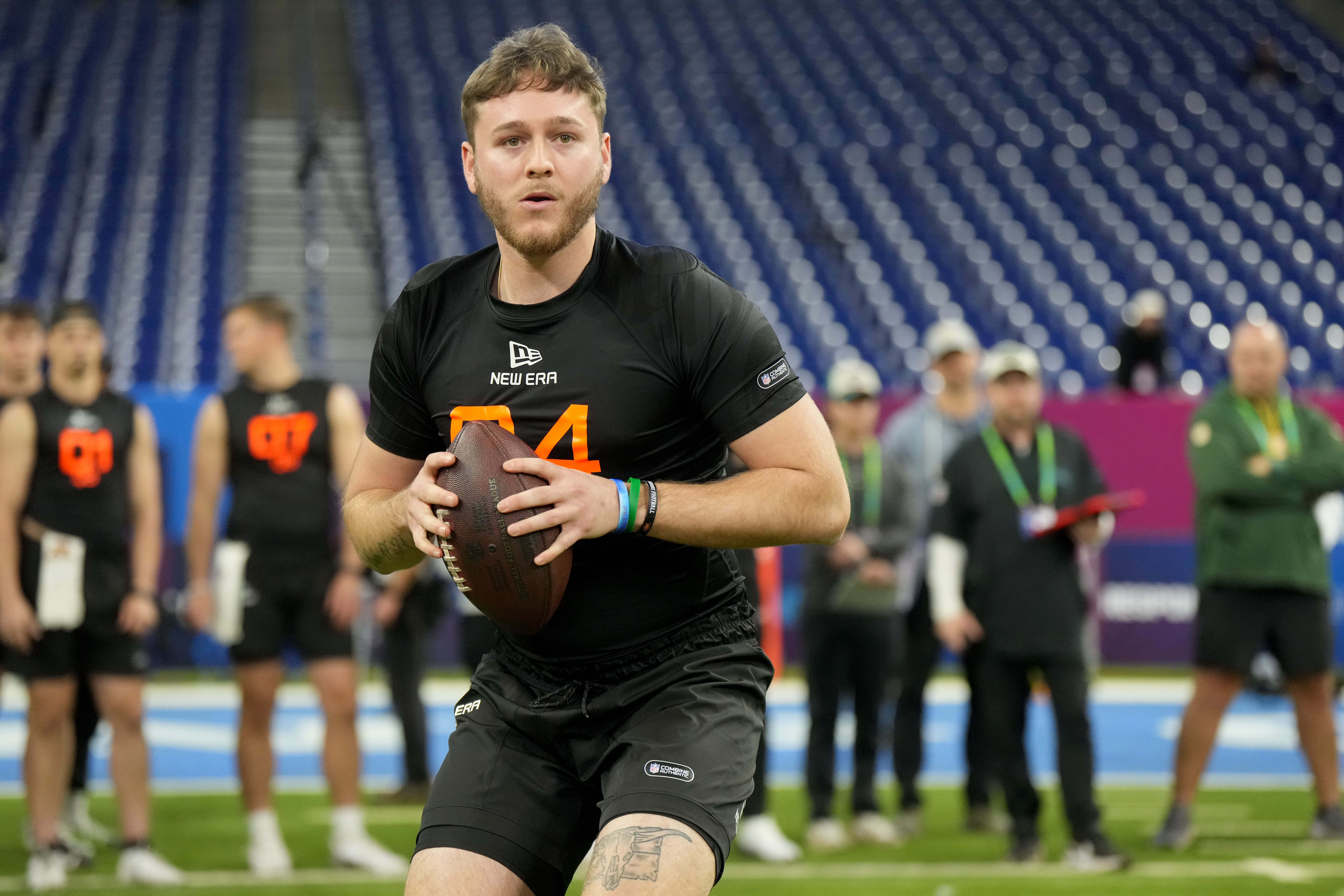 Mar 1, 2025; Indianapolis, IN, USA; Texas quarterback Quinn Ewers (QB04) during the 2025 NFL Combine at Lucas Oil Stadium.
