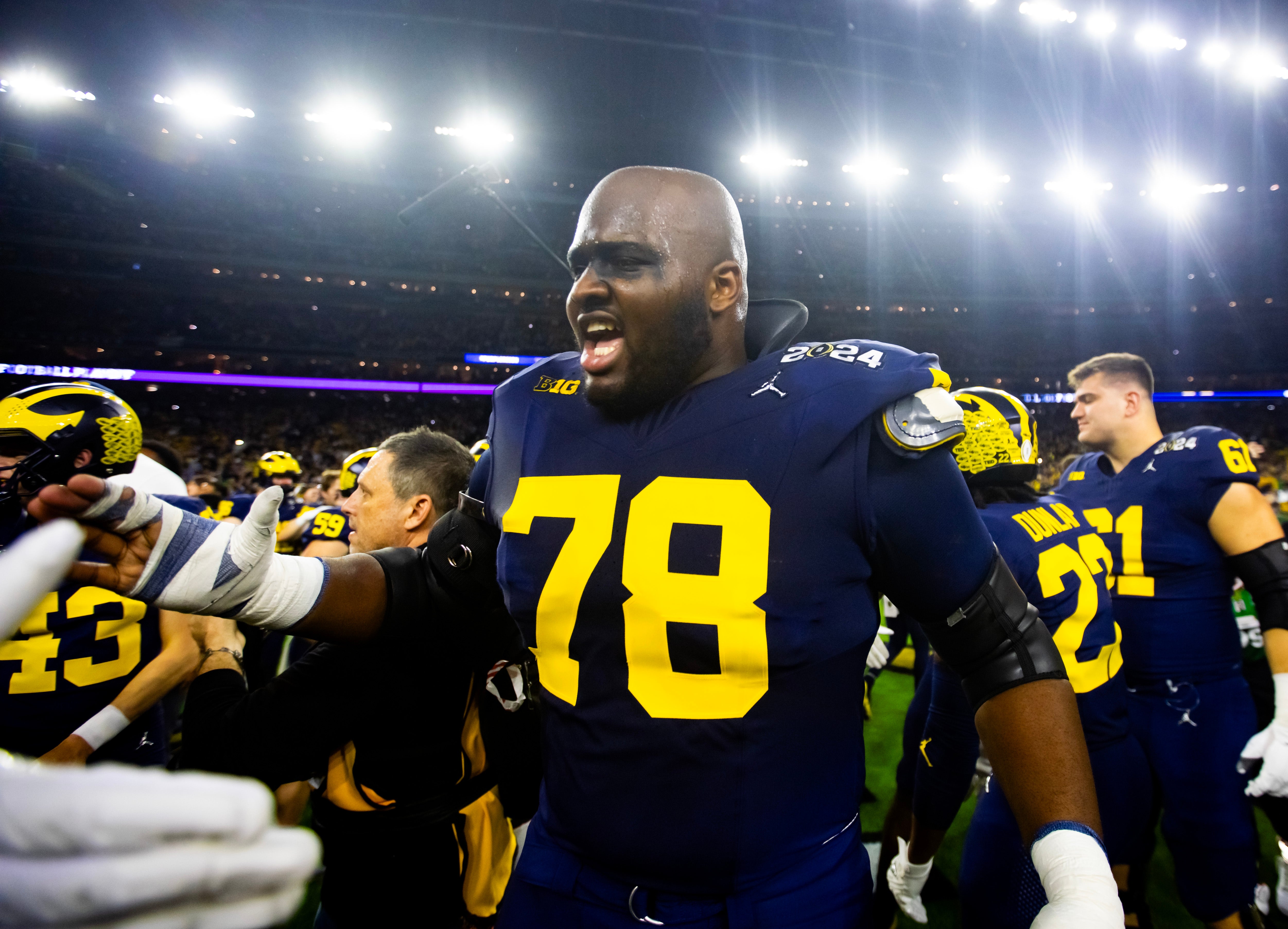 Jan 8, 2024; Houston, TX, USA; Michigan Wolverines offensive lineman Myles Hinton (78) celebrates after defeating the Washington Huskies during the 2024 College Football Playoff national championship game at NRG Stadium.