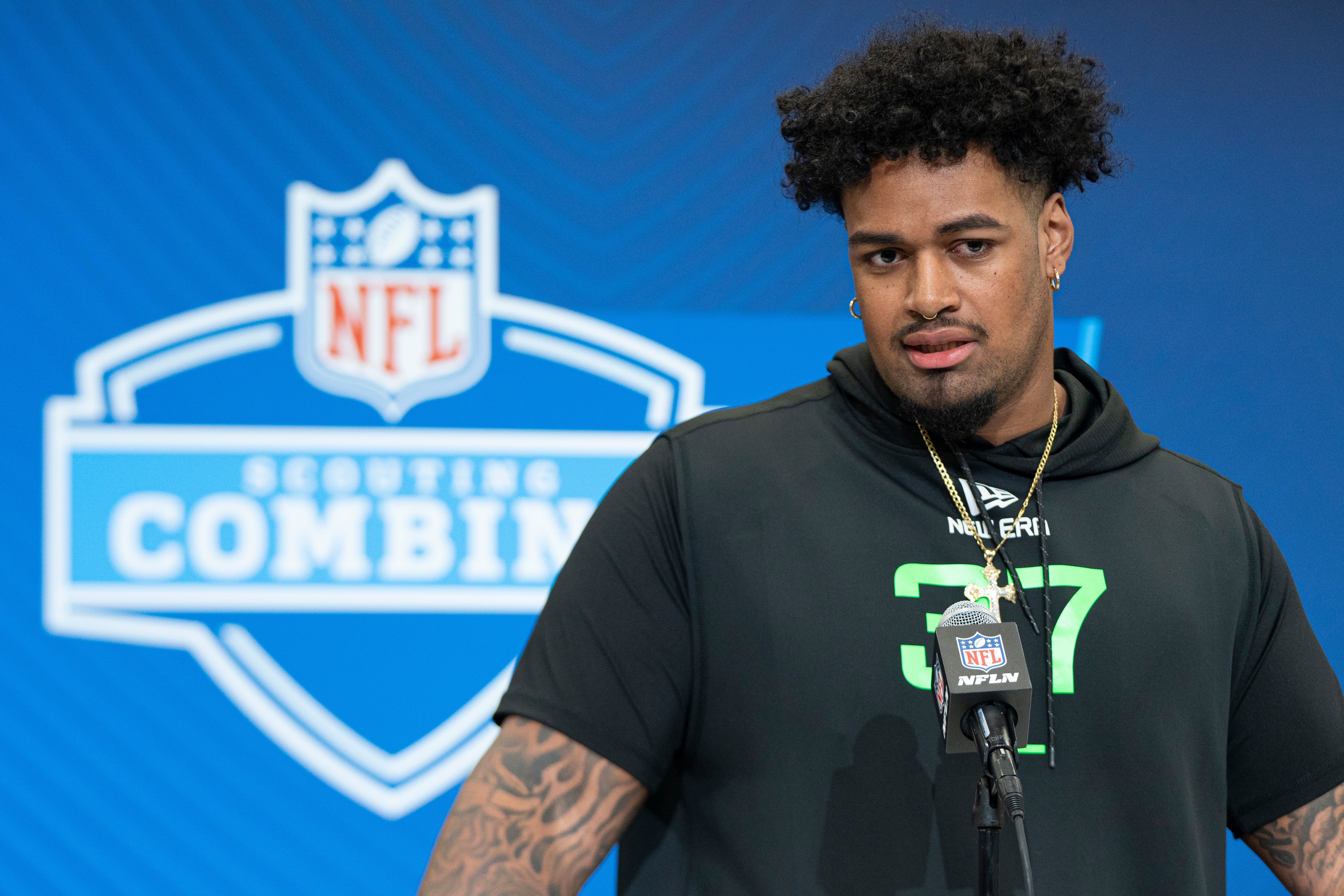 Mar 1, 2025; Indianapolis, IN, USA; Ohio State University offensive lineman Josh Simmons (OL37) answers questions at a press conference during the 2025 NFL Combine at Indiana Convention Center.