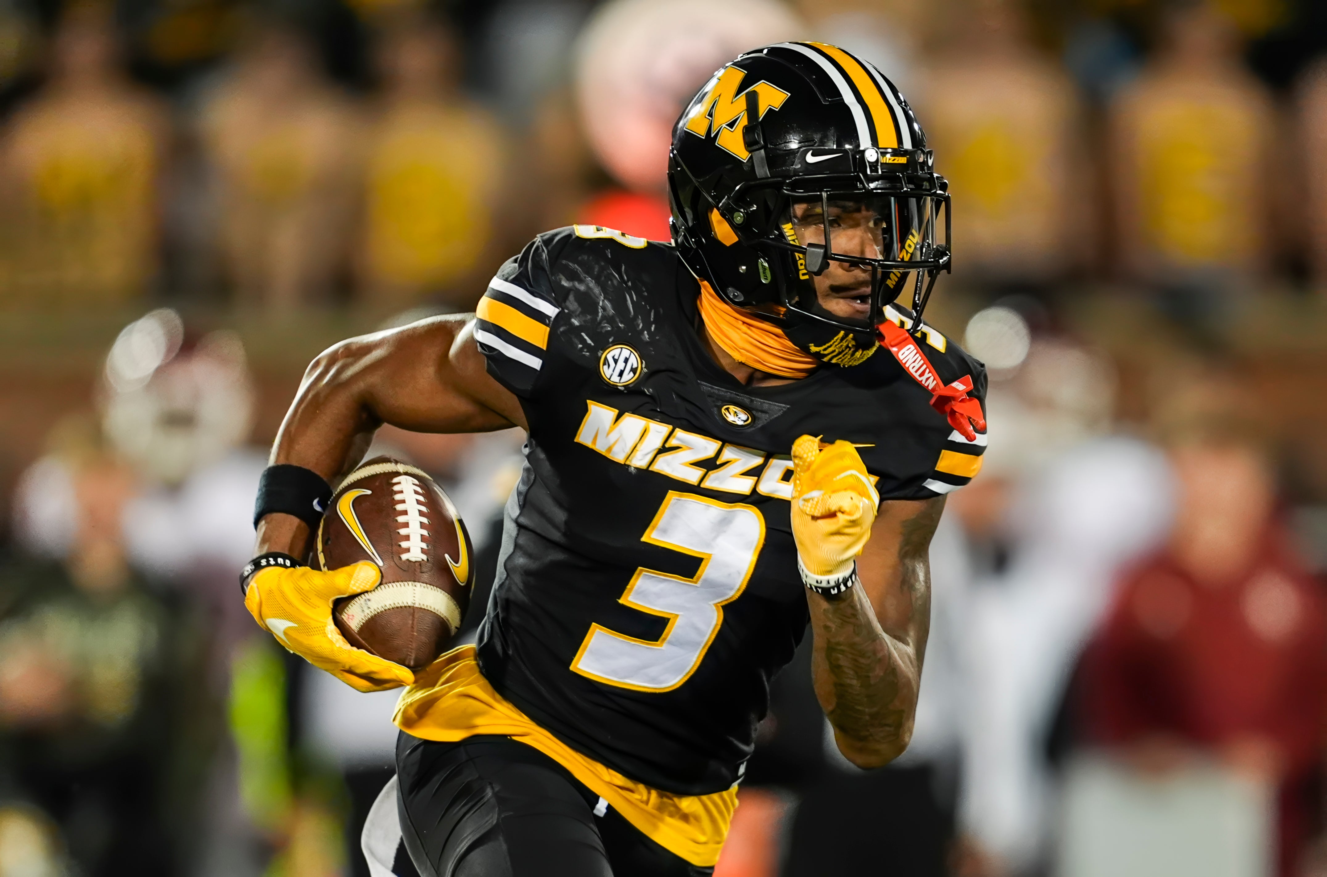 Nov 9, 2024; Columbia, Missouri, USA; Missouri Tigers wide receiver Luther Burden III (3) runs with the ball during the first half against the Oklahoma Sooners at Faurot Field at Memorial Stadium.