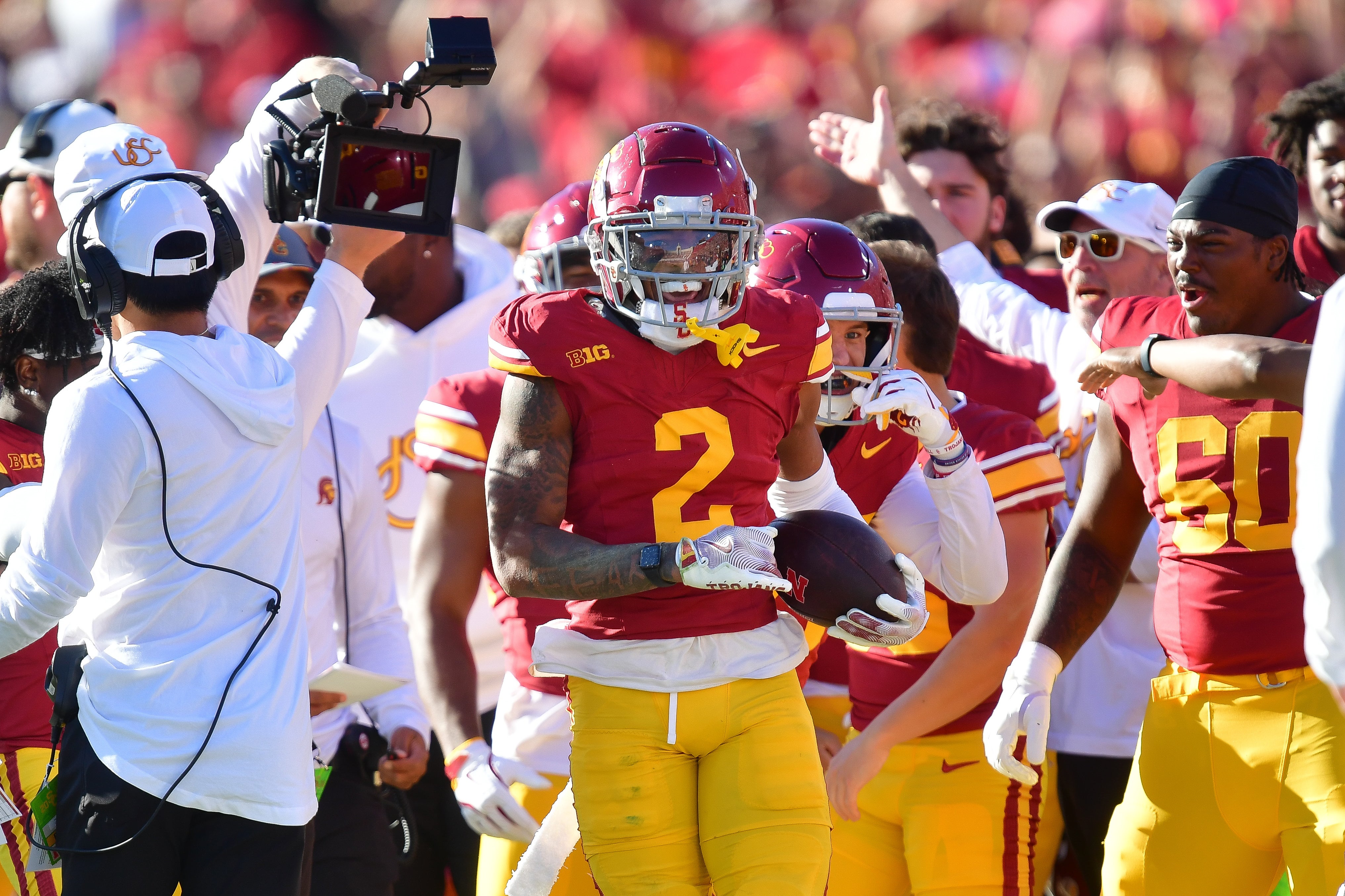 Nov 16, 2024; Los Angeles, California, USA; Southern California Trojans cornerback Jaylin Smith (2) reacts after intercepting a pass against the Nebraska Cornhuskers during the first half at the Los Angeles Memorial Coliseum.