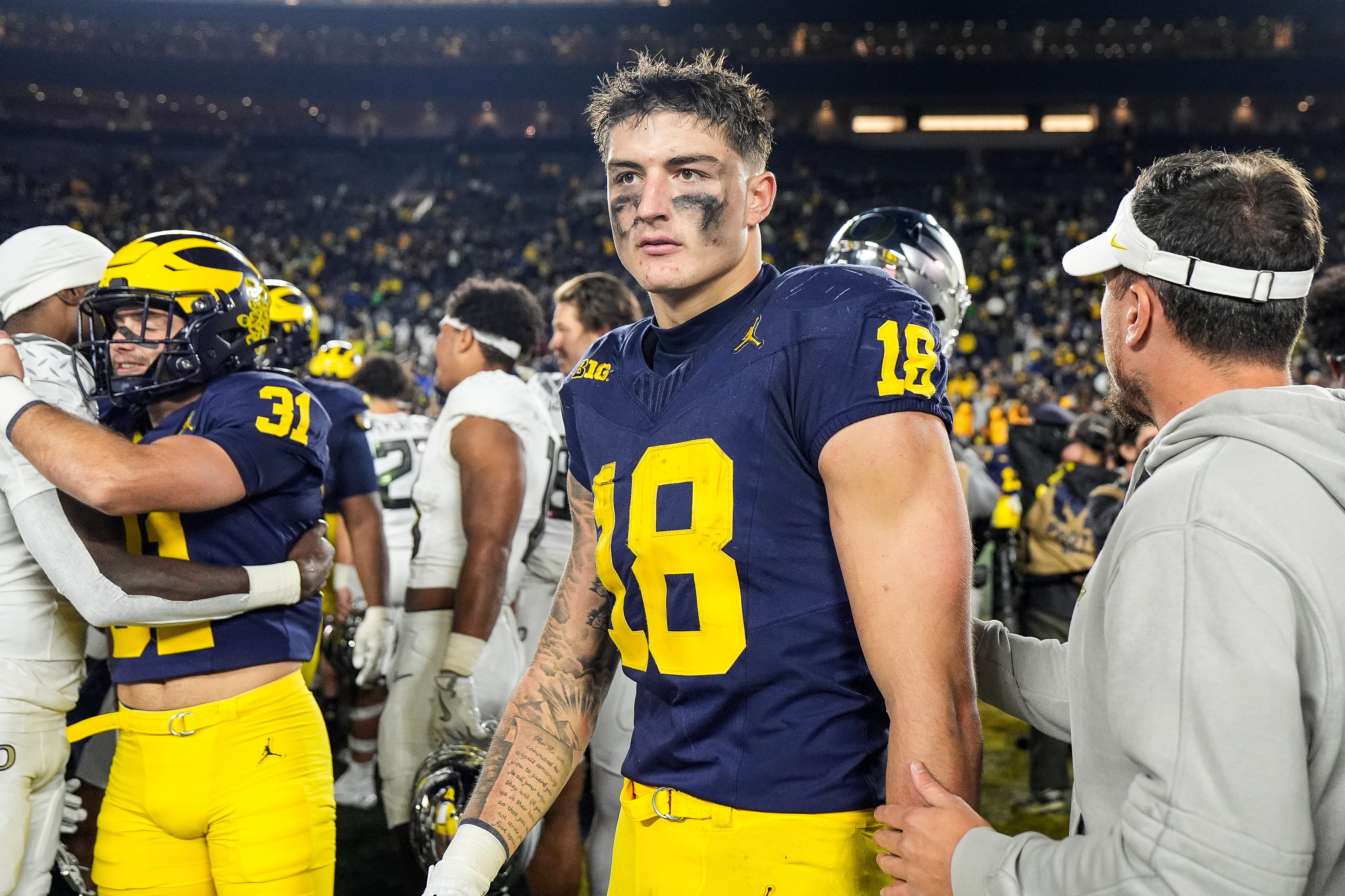 Michigan tight end Colston Loveland (18) walks off the field after 38-17 loss to Oregon at Michigan Stadium in Ann Arbor on Saturday, Nov. 2, 2024.