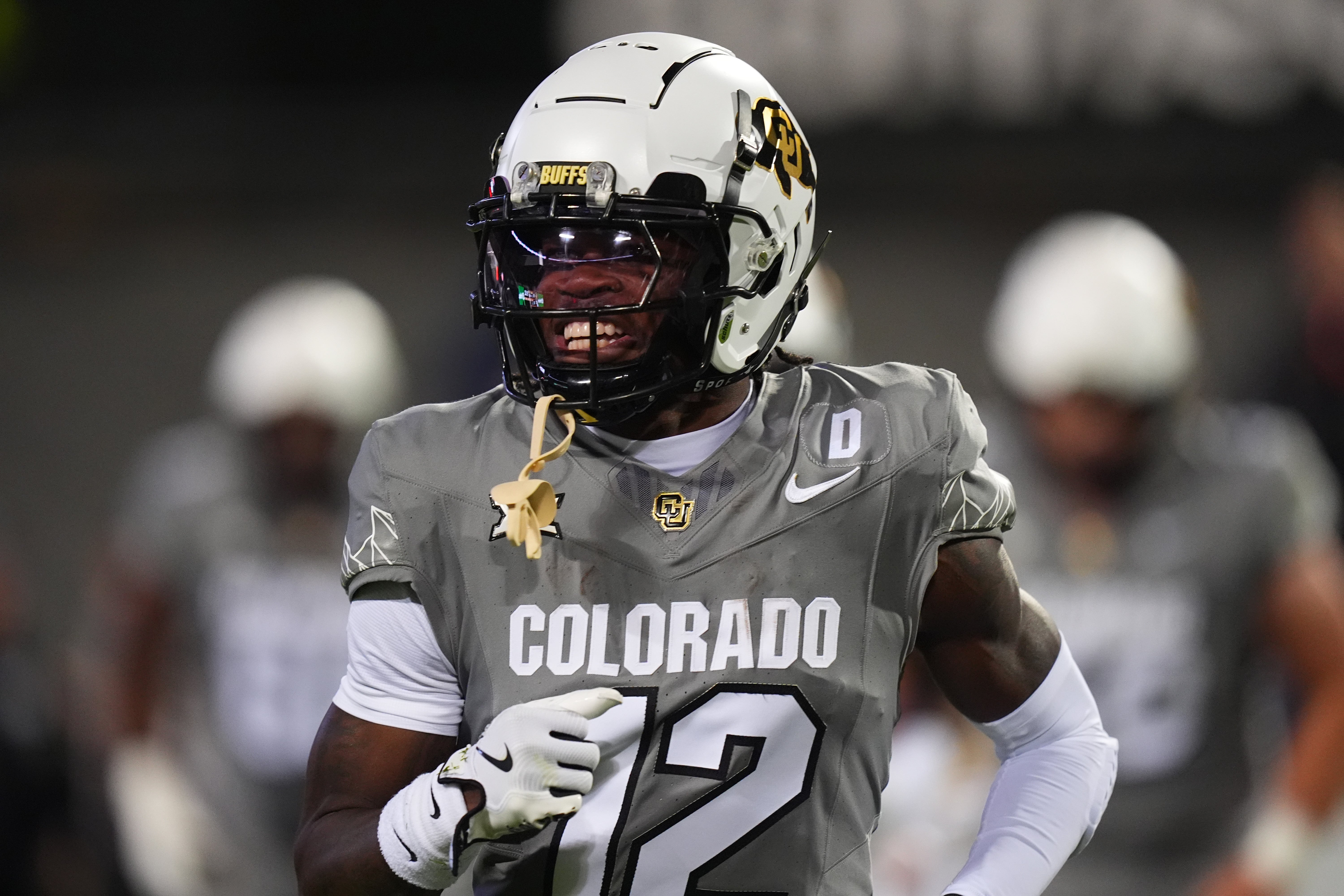Oct 26, 2024; Boulder, Colorado, USA; Colorado Buffaloes wide receiver Travis Hunter (12) reacts after touchdown reception in the first quarter against the Cincinnati Bearcats at Folsom Field.