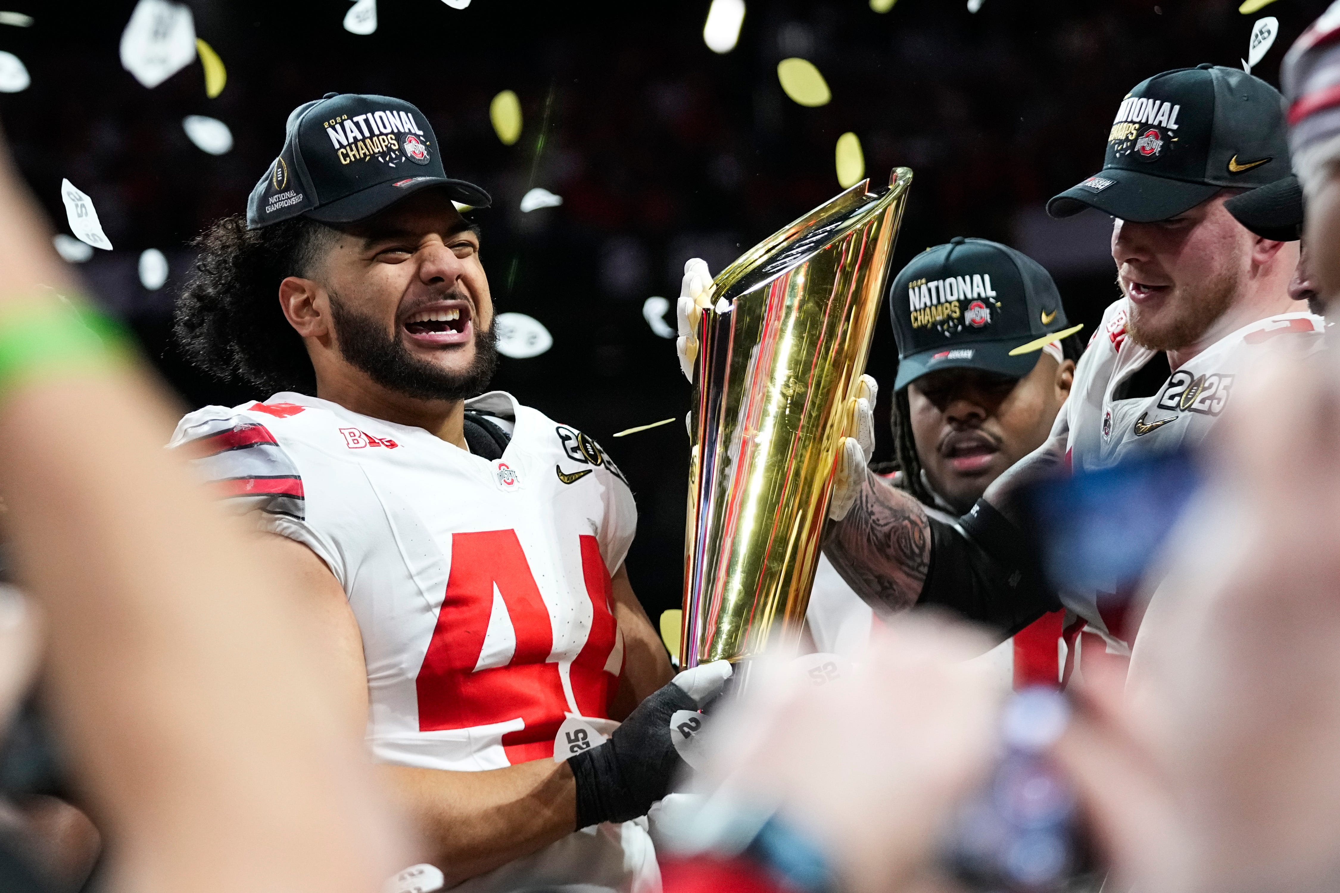 WASHINGTON COMMANDERS: Ohio State Buckeyes defensive end JT Tuimoloau (44) celebrates after defeating Notre Dame Fighting Irish in the College Football Playoff championship game at Mercedes-Benz Stadium in Atlanta on Jan. 21, 2025.
