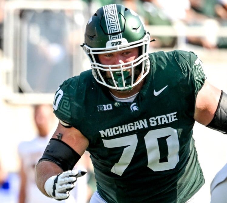 Luke Newman blocks for Aidan Chiles during the game against Prairie View A&M on Saturday, Sept. 14, 2024, at Spartan Stadium in East Lansing.