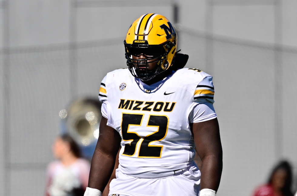 Oct 12, 2024; Amherst, Massachusetts, USA; Missouri Tigers offensive lineman Marcus Bryant (52) at the line of scrimmage during the first half against the Missouri Tigers at Warren McGuirk Alumni Stadium.