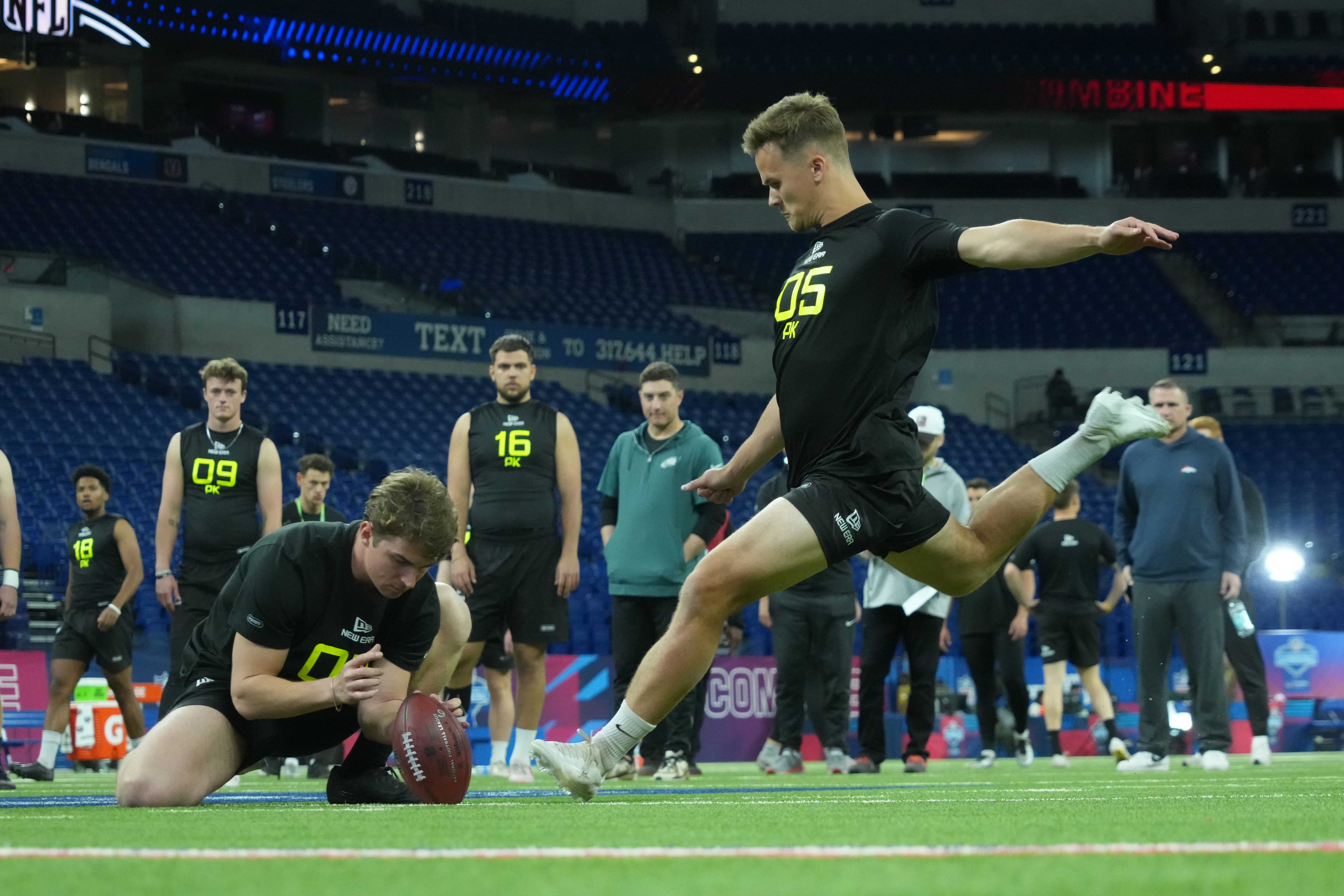 Feb 26, 2025; Indianapolis, IN, USA; Arizona place kicker Tyler Loop (PK05) attempts a field goal during workouts at the 2025 NFL Scouting Combine at Lucas Oil Stadium.