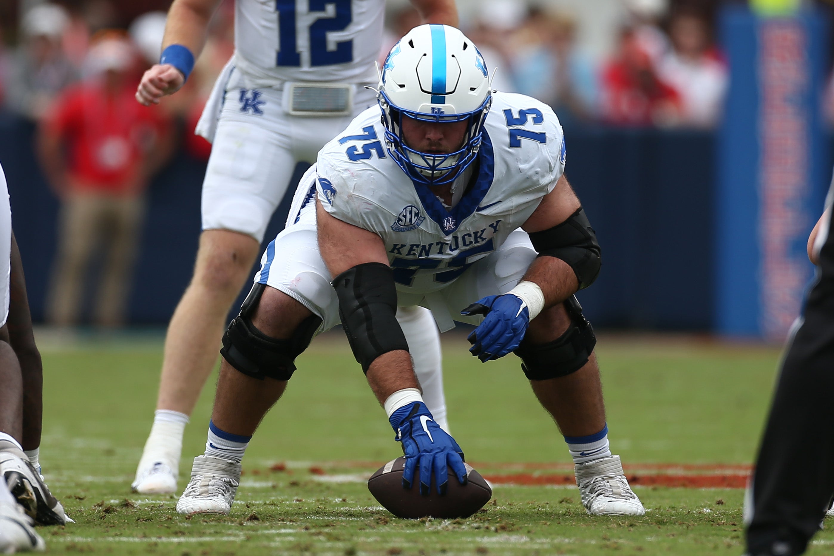 Sep 28, 2024; Oxford, Mississippi, USA; Kentucky Wildcats offensive lineman Eli Cox (75) waits to snap the ball during the first half against the Mississippi Rebels at Vaught-Hemingway Stadium.