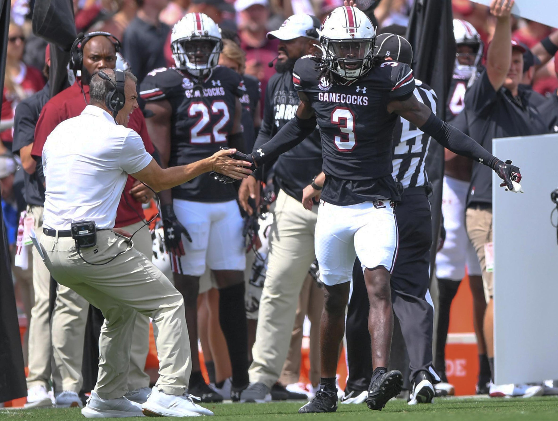 Sep 14, 2024; Columbia, South Carolina, USA; South Carolina Gamecocks head coach Shane Beamer congratulates defensive back O'Donnell Fortune (3) after a defensive play against the LSU Tigers during the first quarter at Williams-Brice Stadium.