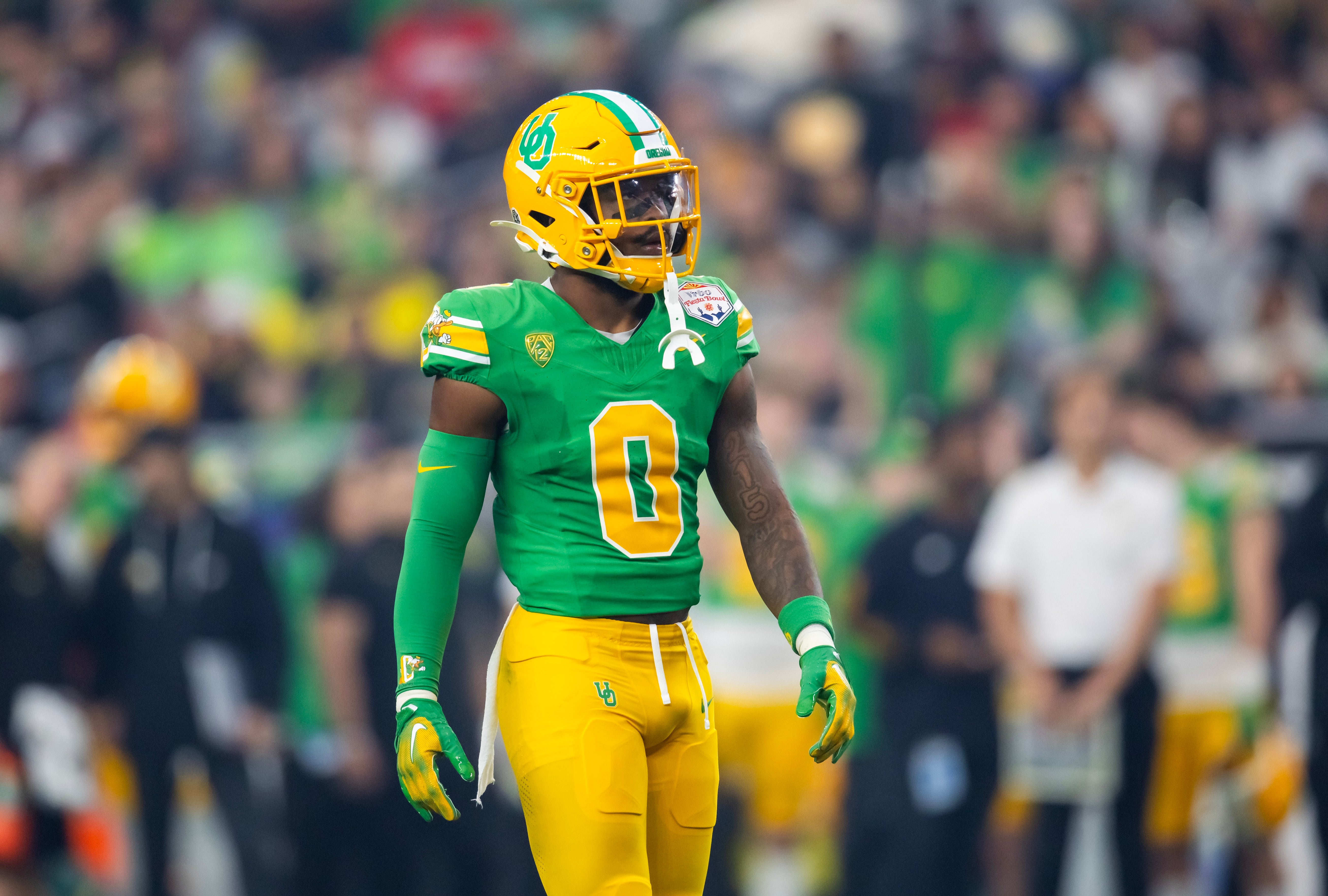 Jan 1, 2024; Glendale, AZ, USA; Oregon Ducks defensive back Tysheem Johnson (0) against the Liberty Flames during the 2024 Fiesta Bowl at State Farm Stadium.