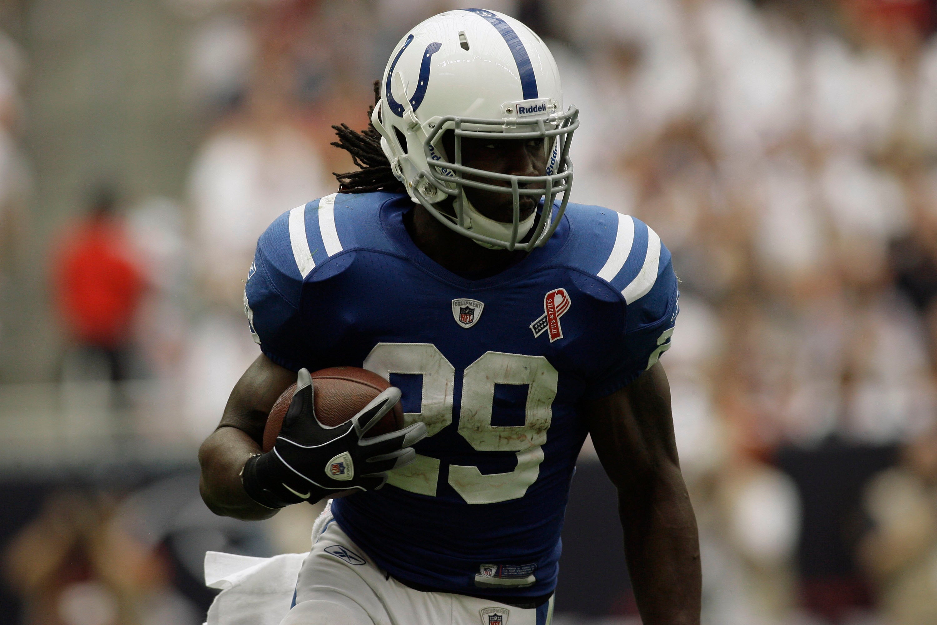 Sept 11, 2011; Houston, TX, USA; Indianapolis Colts running back Joseph Addai (29) runs the ball against the Houston Texans in the second quarter at Reliant Stadium.