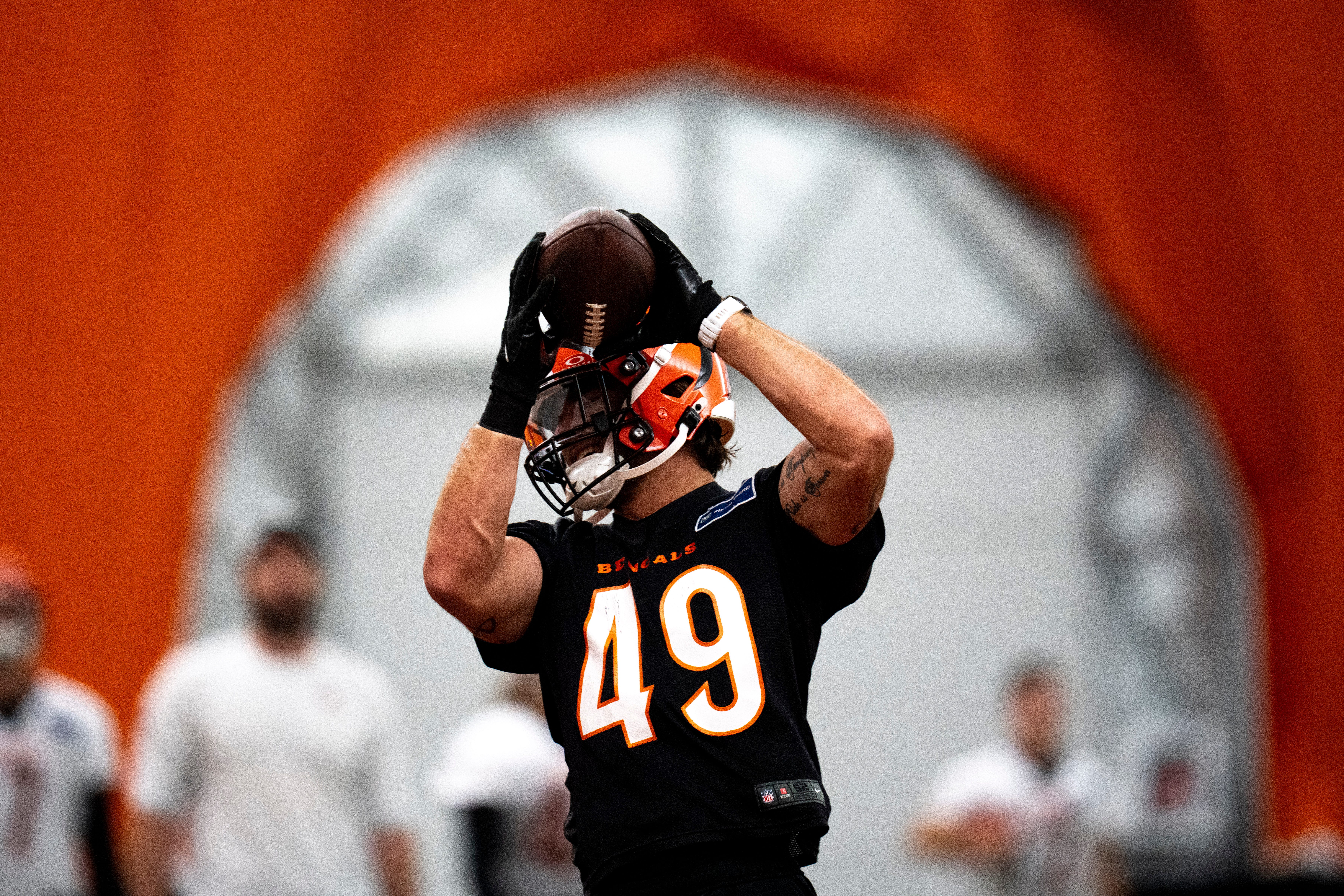 Cincinnati Bengals linebacker Joe Bachie (49) catches a pass during an interception drill at Bengals spring practice at the IEL Indoor Facility in Cincinnati on Thursday, June 13, 2024.