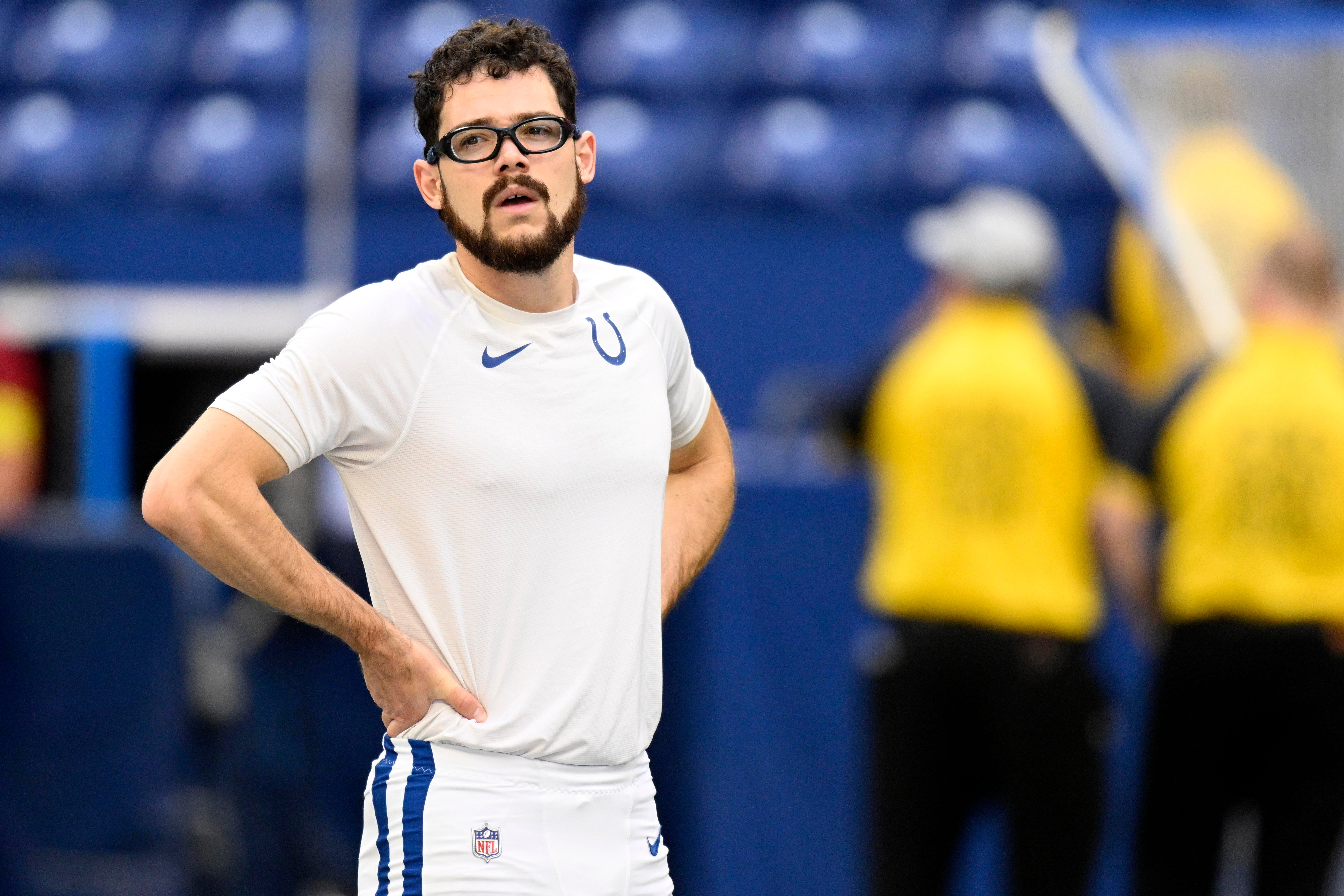 Aug 27, 2022; Indianapolis, Indiana, USA; Indianapolis Colts Rodrigo Blankenship (3) stretches on the field before the game against the Tampa Bay Buccaneers at Lucas Oil Stadium.