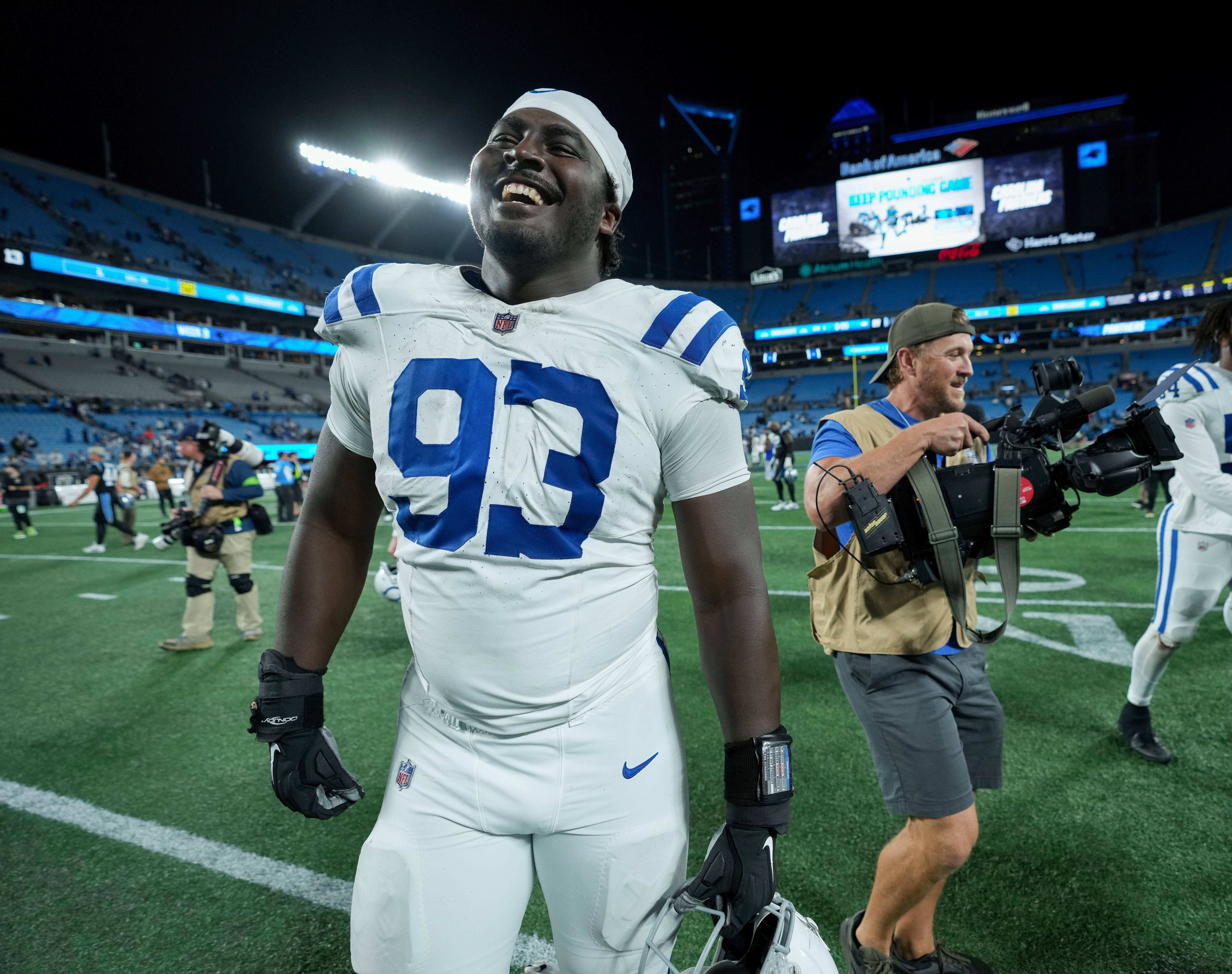 Nov 5, 2023, Charlotte, North Carolina, USA; Indianapolis Colts defensive tackle Eric Johnson II (93) smiles as he leaves the field after a game against the Carolina Panthers at Bank of America Stadium.