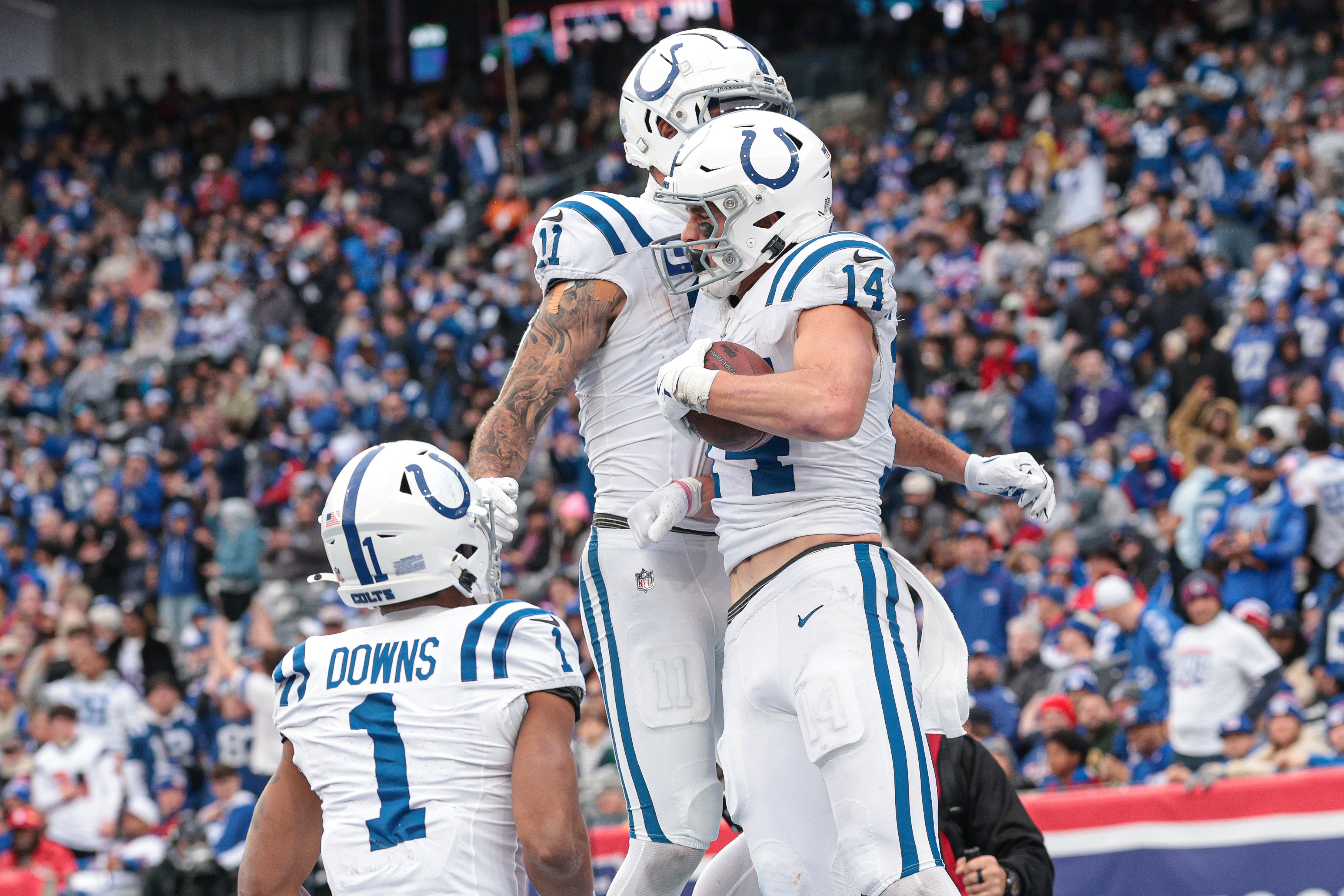 Dec 29, 2024; East Rutherford, New Jersey, USA; Indianapolis Colts wide receiver Alec Pierce (14) celebrates his touchdown reception with teammates during the second half against the New York Giants at MetLife Stadium.