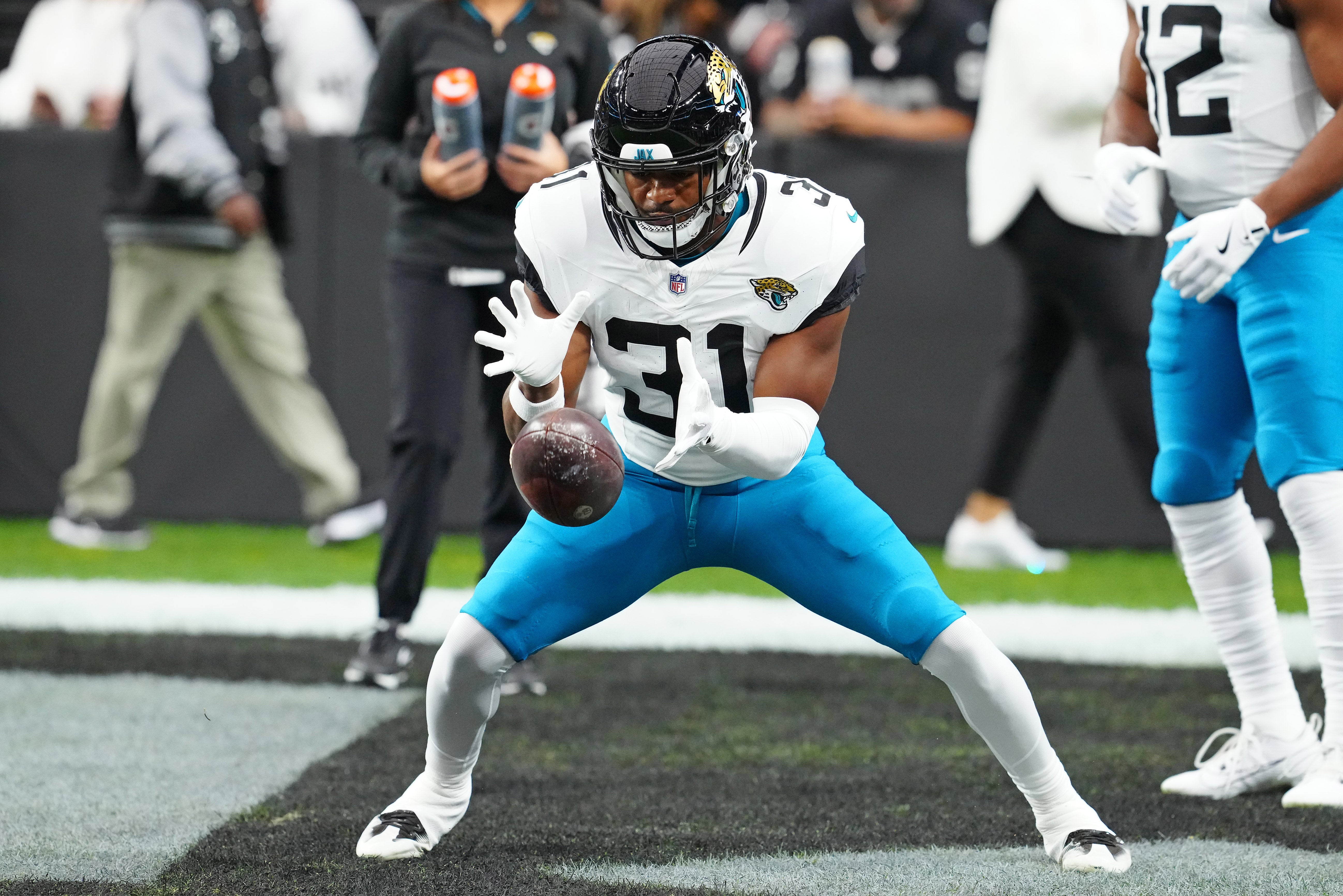 Dec 22, 2024; Paradise, Nevada, USA; Jacksonville Jaguars running back Keilan Robinson (31) warms up before a game against the Las Vegas Raiders at Allegiant Stadium.