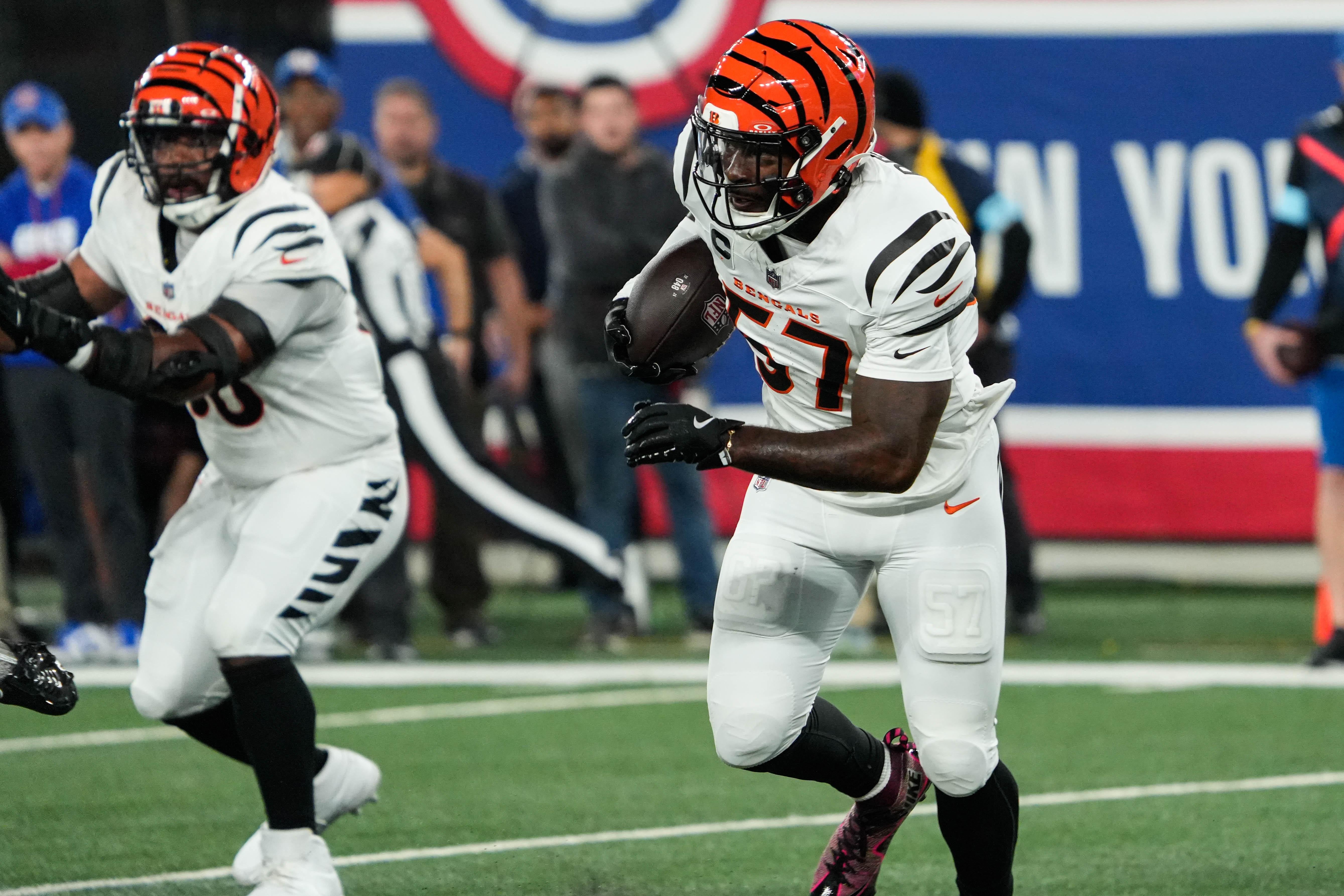Bengals Germaine Pratt (57) takes the ball down the field after an interception during their game against the Giants at MetLife Stadium on Sunday October 13, 2024. Bengals lead the game 7-0 at halftime.