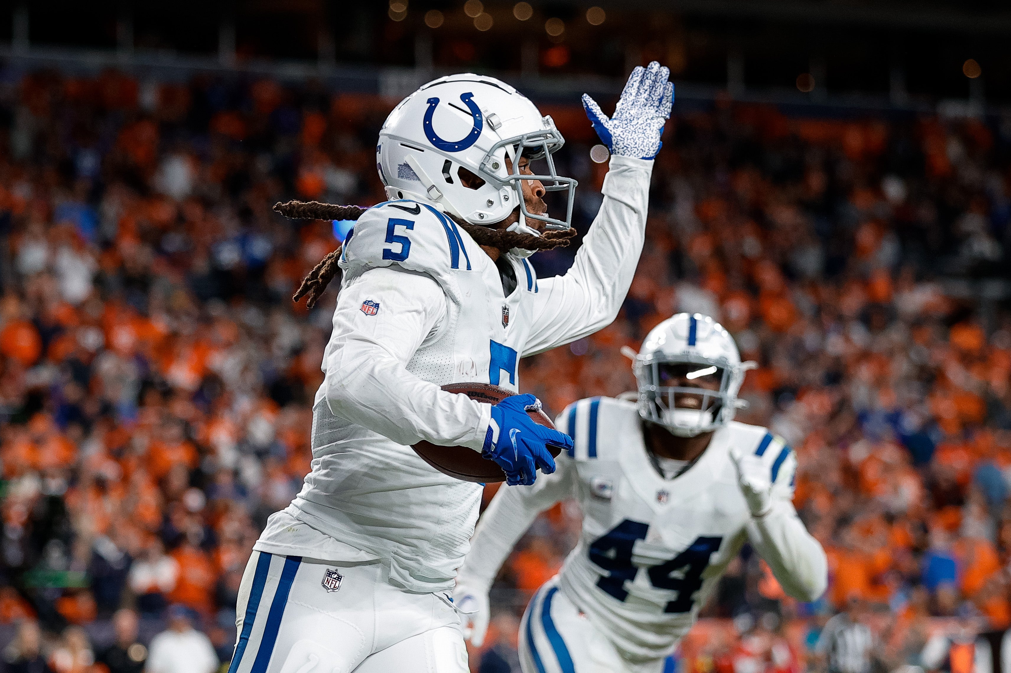 Oct 6, 2022; Denver, Colorado, USA; Indianapolis Colts cornerback Stephon Gilmore (5) reacts after an interception in the fourth quarter against the Denver Broncos at Empower Field at Mile High.