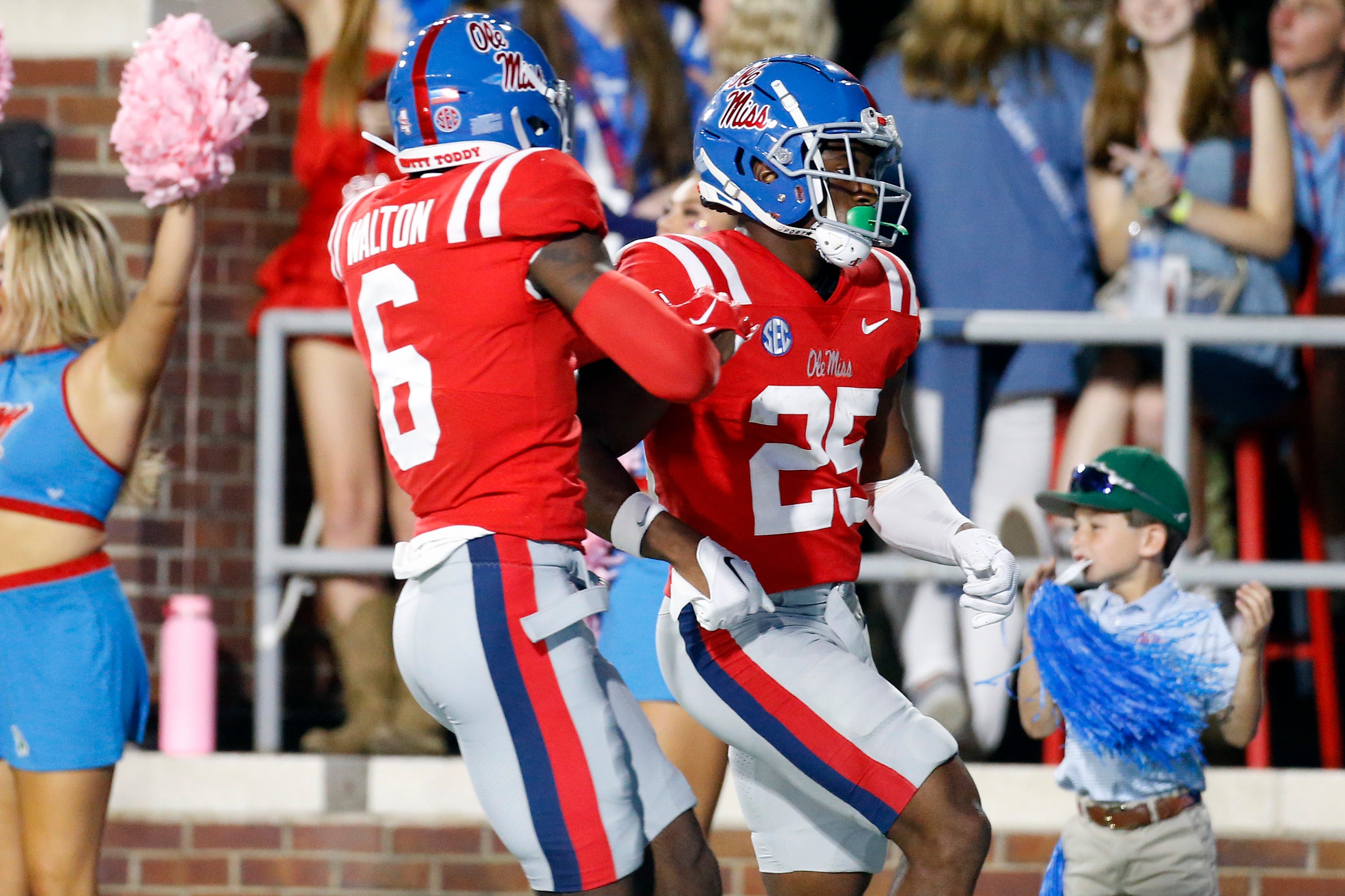 Oct 28, 2023; Oxford, Mississippi, USA; Mississippi Rebels defensive back Zamari Walton (6) reacts with defensive back Trey Washington (25) after an interception during the first half against the Vanderbilt Commodores at Vaught-Hemingway Stadium.