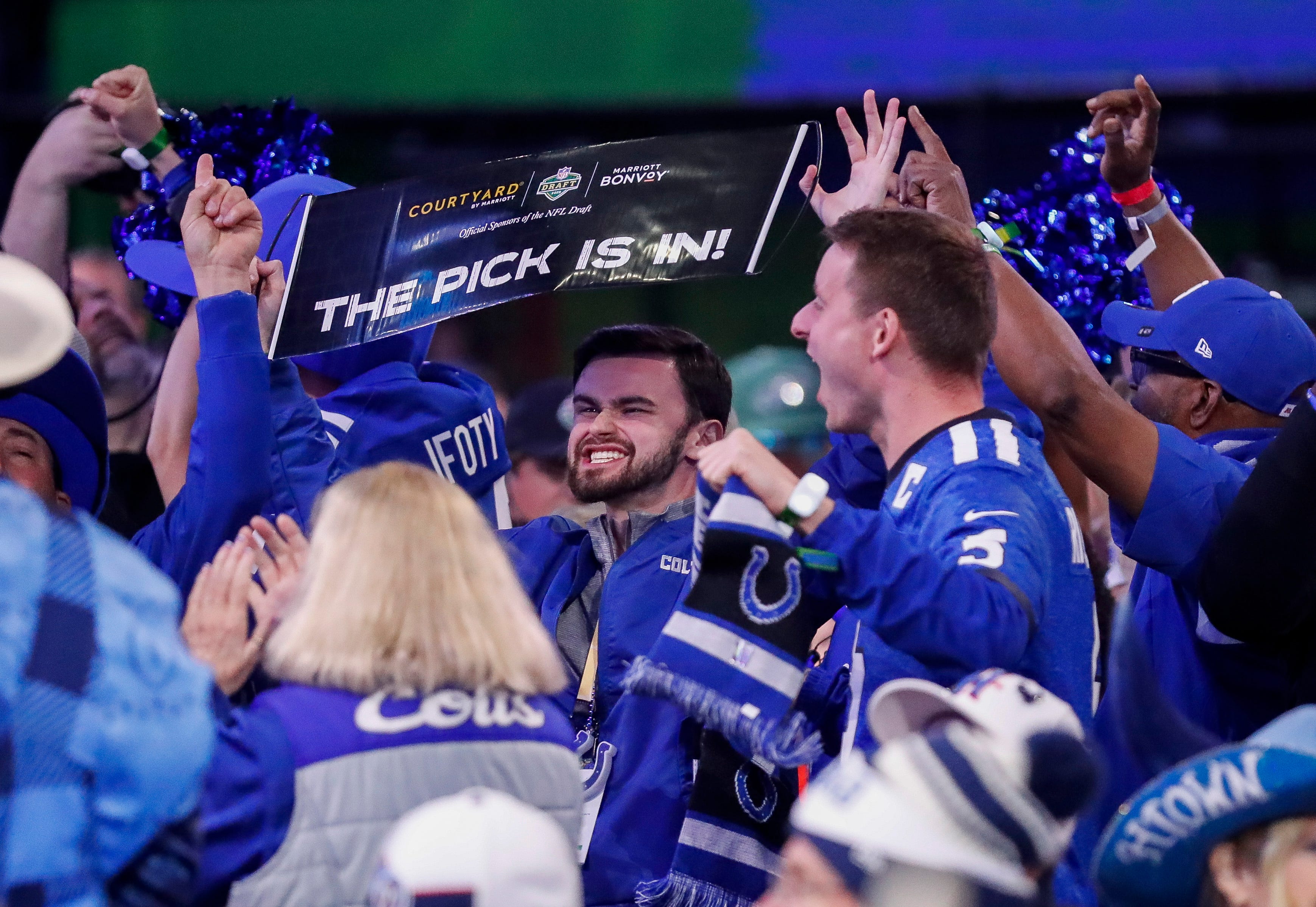 Indianapolis Colts fans celebrate after the team selects tight end Tyler Warren with the 14th pick during the first round of the 2025 NFL Draft on Thursday, April 24, 2025, at Lambeau Field in Green Bay, Wisconsin. The draft runs through April 26.