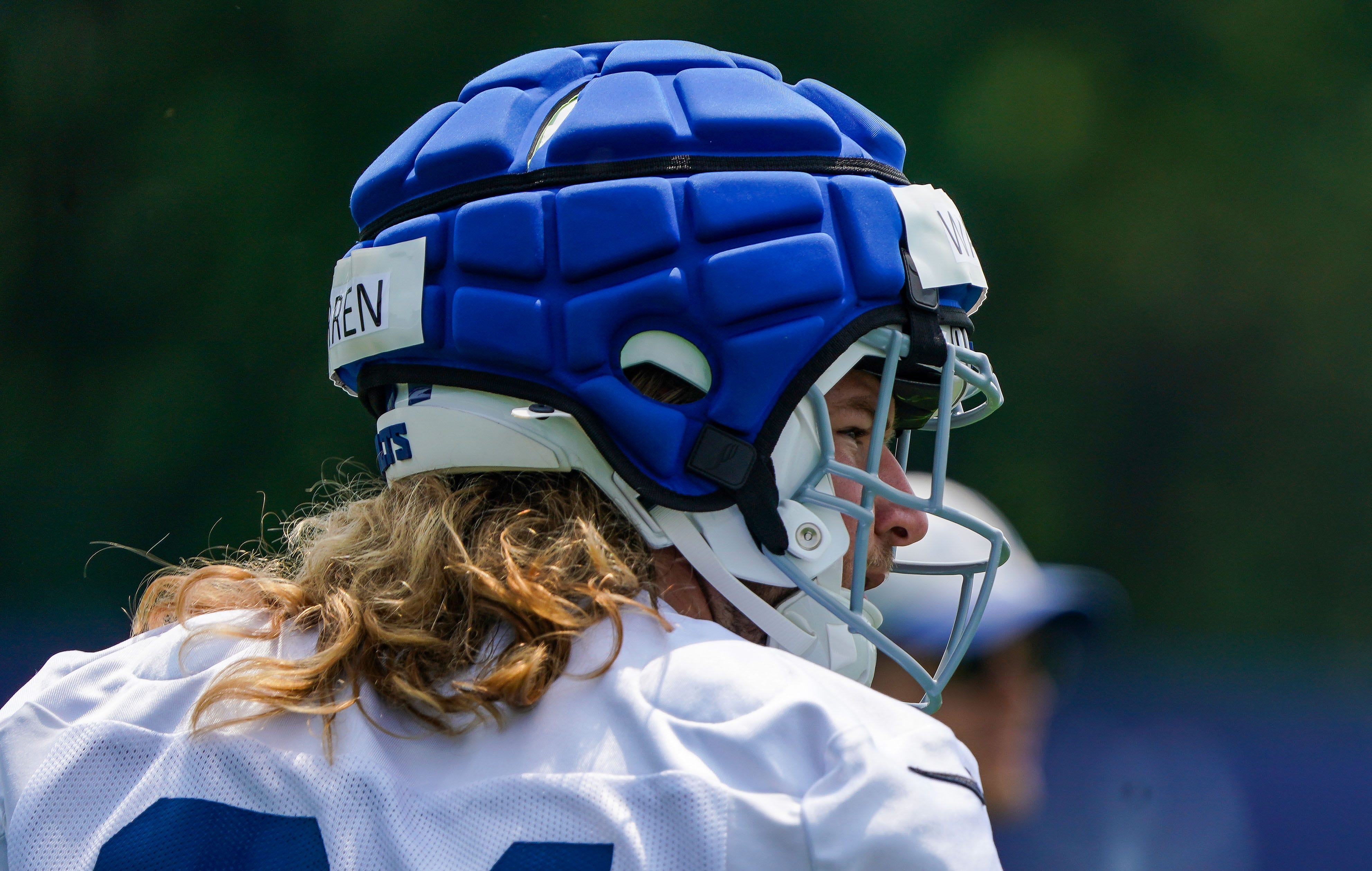 Indianapolis Colts tight end Tyler Warren (84) walks off the field Tuesday, June 10, 2025, during NFL Colts mandatory mini camp at the Indiana Farm Bureau Football Center in Indianapolis.