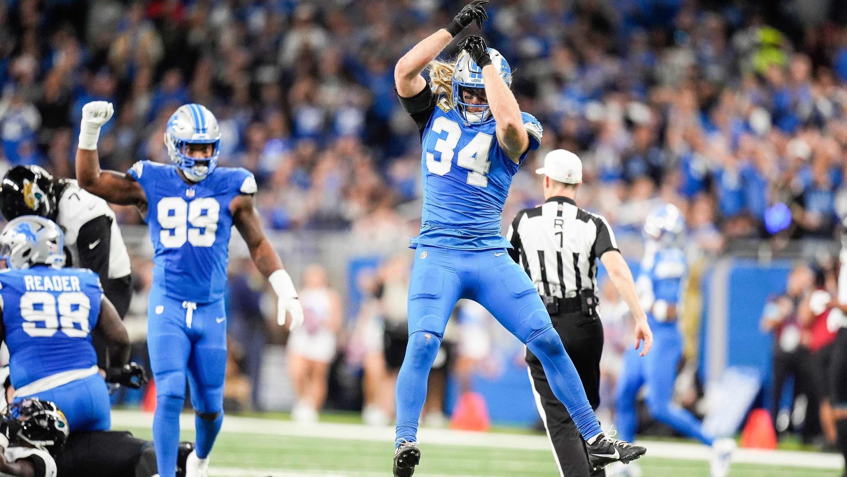 Detroit Lions linebacker Alex Anzalone (34) celebrates a play against Jacksonville Jaguars during the first half at Ford Field in Detroit on Sunday, Nov. 17, 2024.
