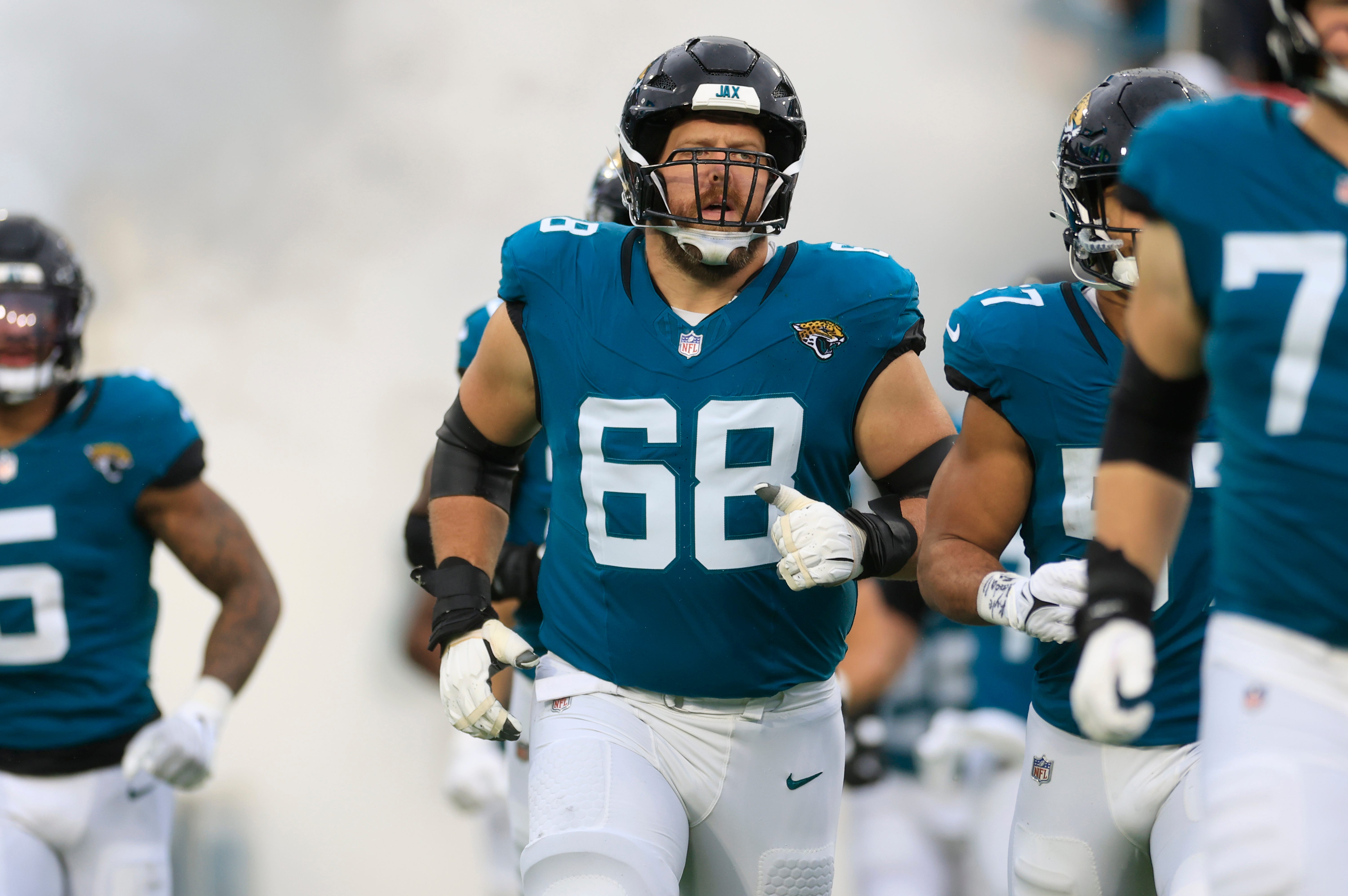 Jacksonville Jaguars guard Brandon Scherff (68) runs on the field before an NFL football matchup Sunday, Dec. 29, 2024 at EverBank Stadium in Jacksonville, Fla. The Jaguars held off the Titans 20-13.