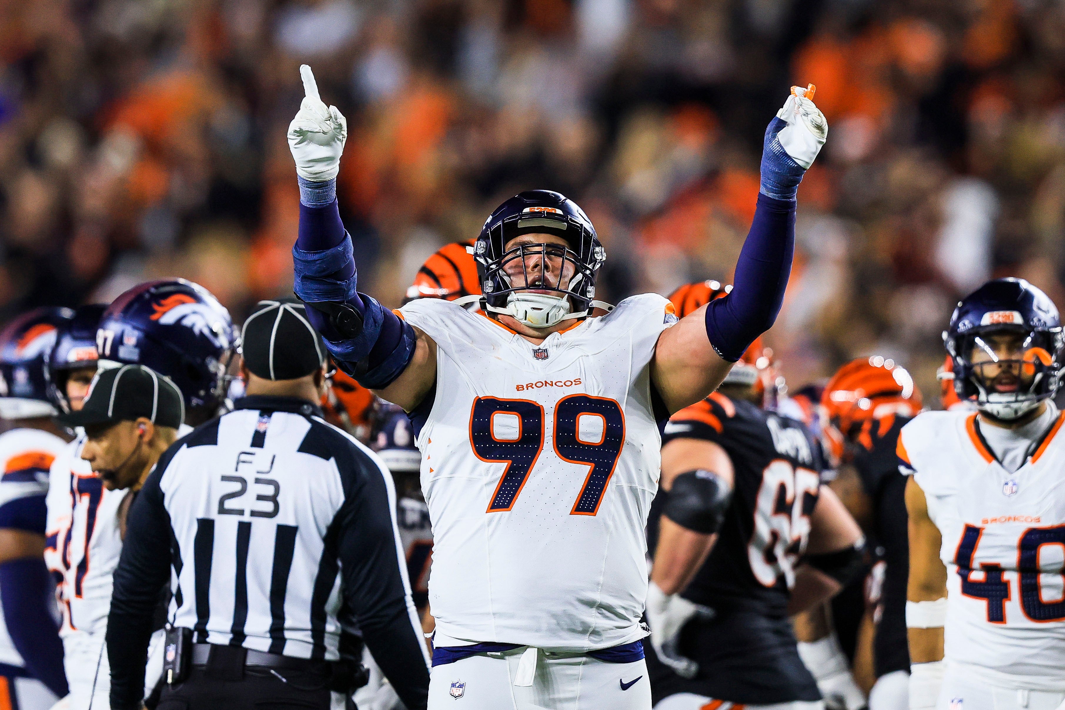 Dec 28, 2024; Cincinnati, Ohio, USA; Denver Broncos defensive end Zach Allen (99) reacts after a play against the Cincinnati Bengals in the second half at Paycor Stadium.