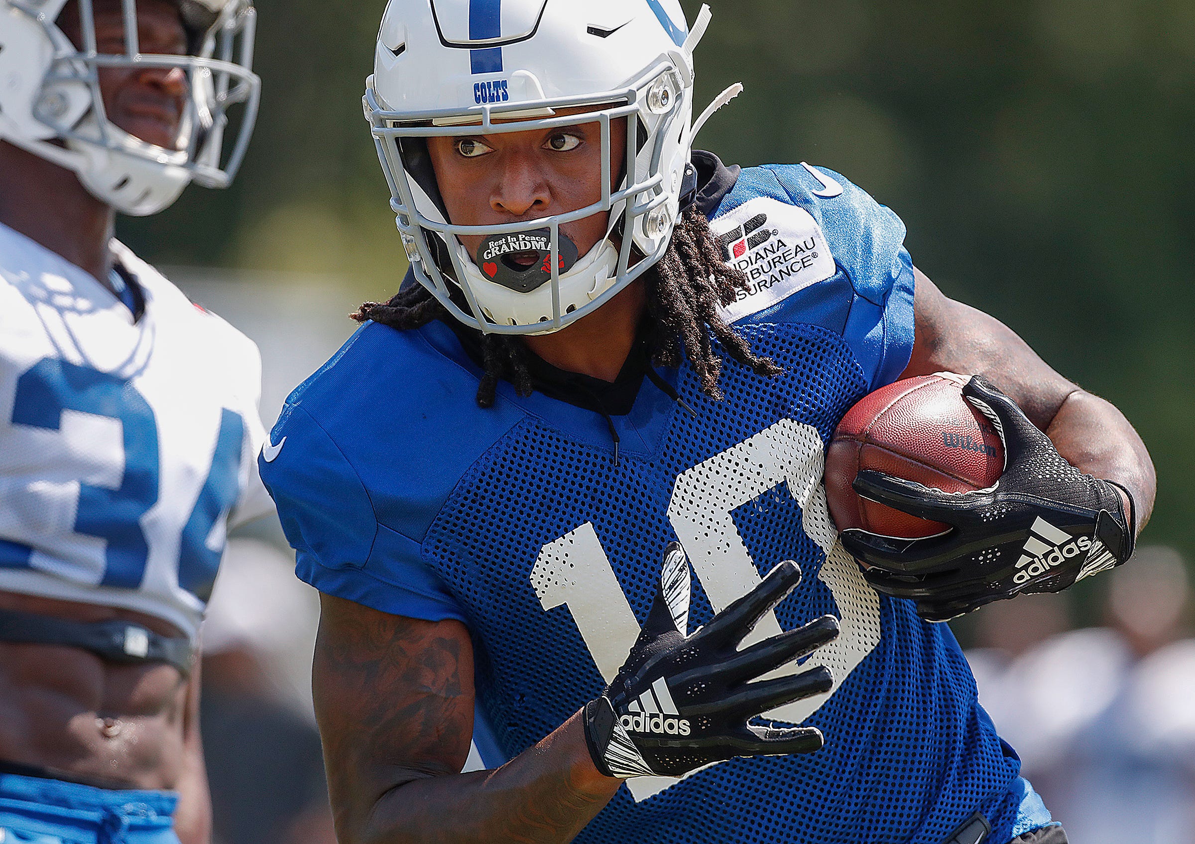 Indianapolis Colts wide receiver Reece Fountain (10) runs by cornerback Rock Ya-Sin (34) during the Colts preseason training camp practice at Grand Park in Westfield on Saturday, August 3, 2019. Colts Preseason Training Camp