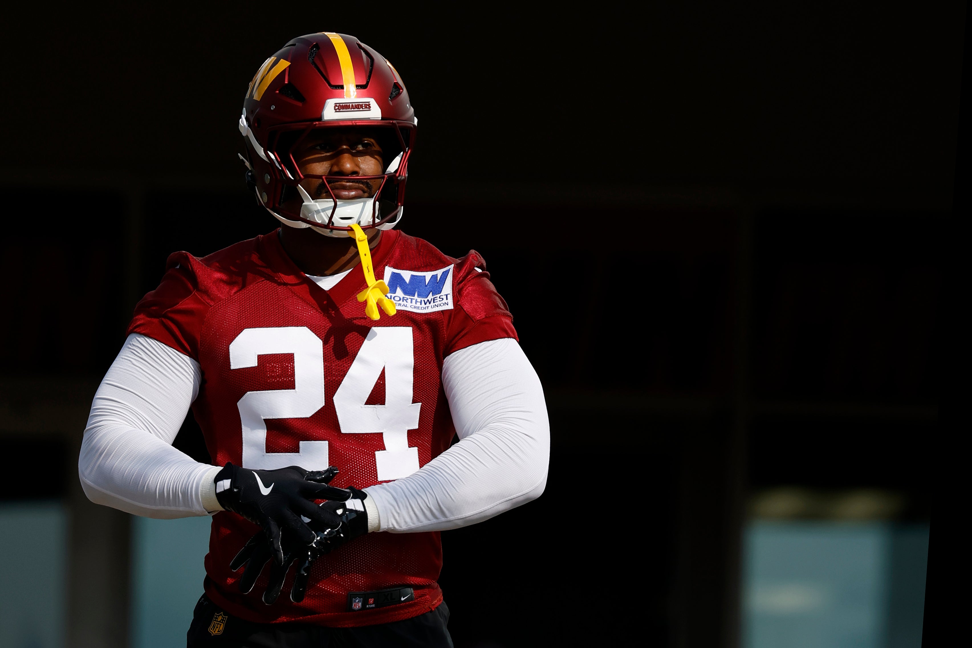Jul 23, 2025; Ashburn, VA, USA; Washington Commanders outside linebacker Von Miller (24) walks out of team headquarters onto the fields prior to practice on day one of training camp at OrthoVirginia Training Center at Commanders Park. 