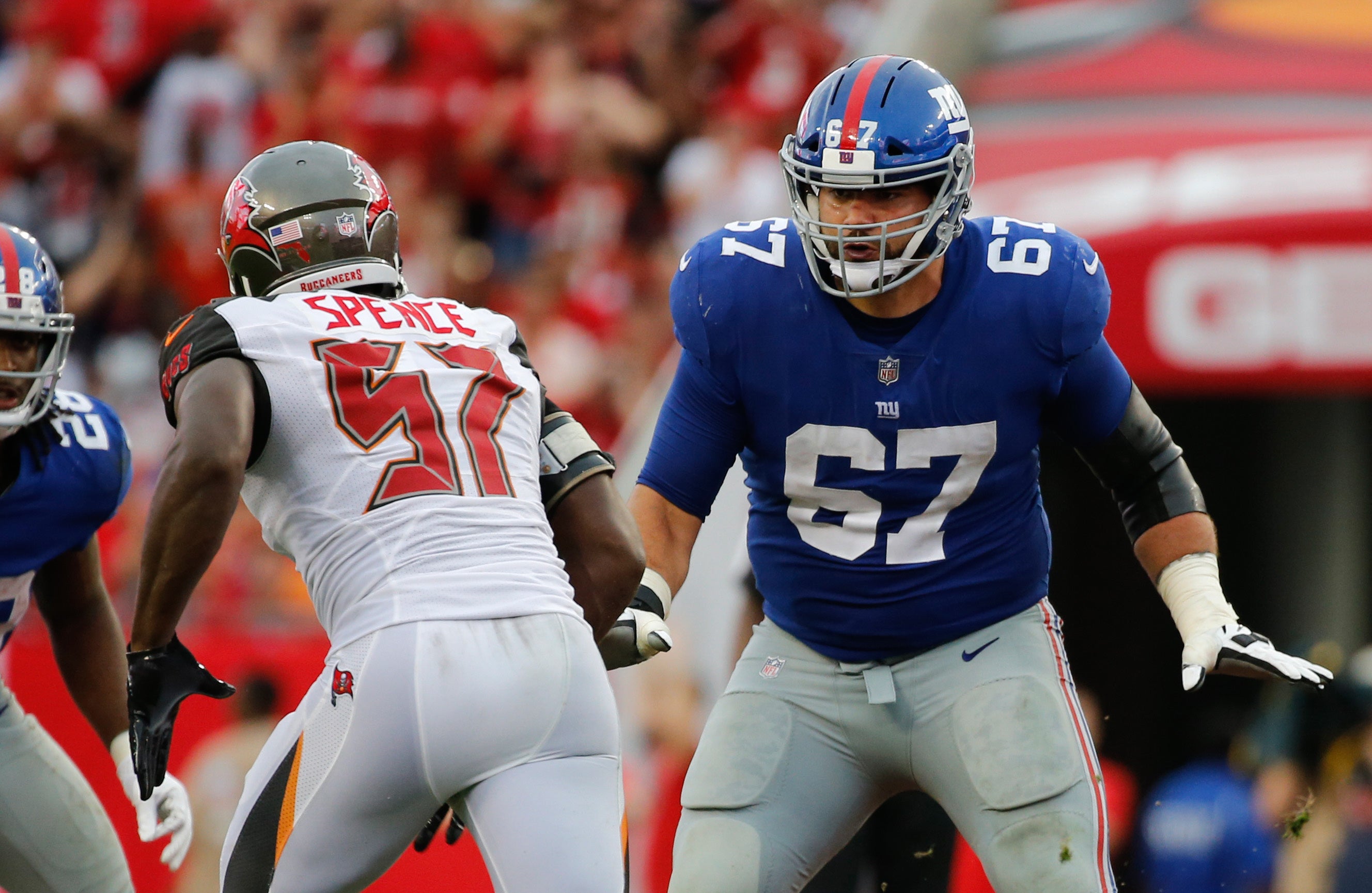 Oct 1, 2017; Tampa, FL, USA; New York Giants offensive guard Justin Pugh (67) blocks as Tampa Bay Buccaneers defensive end Noah Spence (57) rushes during the second half at Raymond James Stadium.
