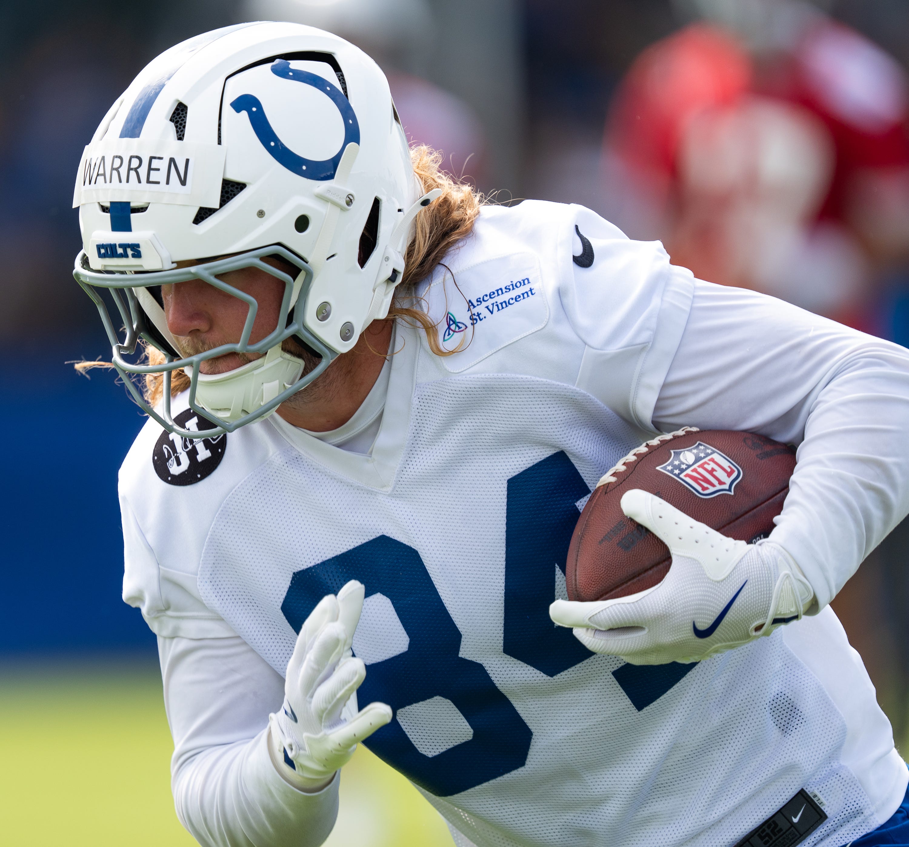 Indianapolis Colts tight end Tyler Warren (84) catches a pass Friday, July 25, 2025, during training camp held at Grand Park in Westfield.