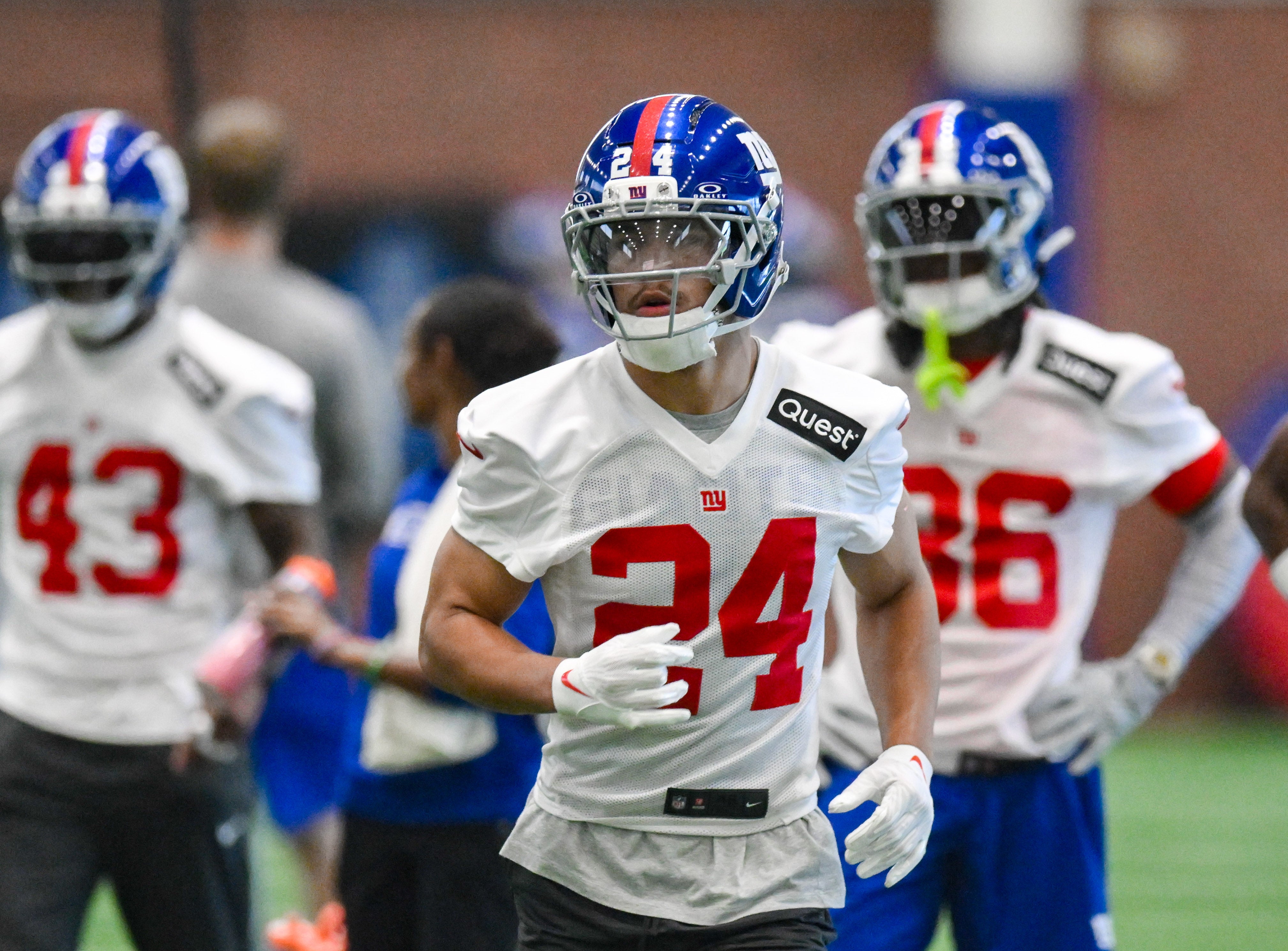 Jun 17, 2025; East Rutherford, NJ, USA; New York Giants safety Dane Belton (24) warms up during minicamp at Quest Diagnostics Training Center.